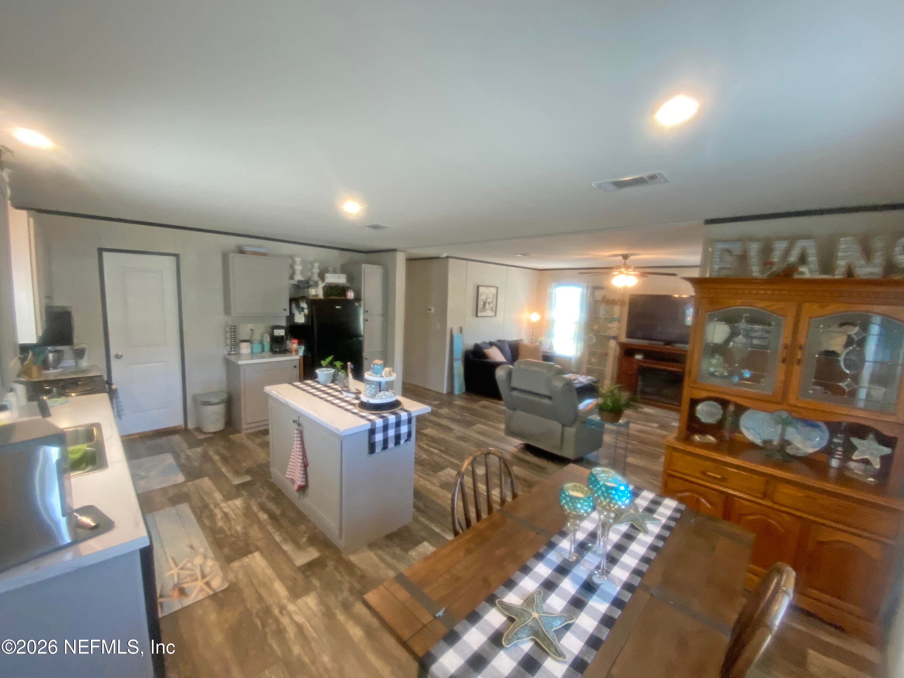 Kitchen, Dining Room and Living Room all open to each other — 203 SW 5TH Avenue, Palatka, FL 32177