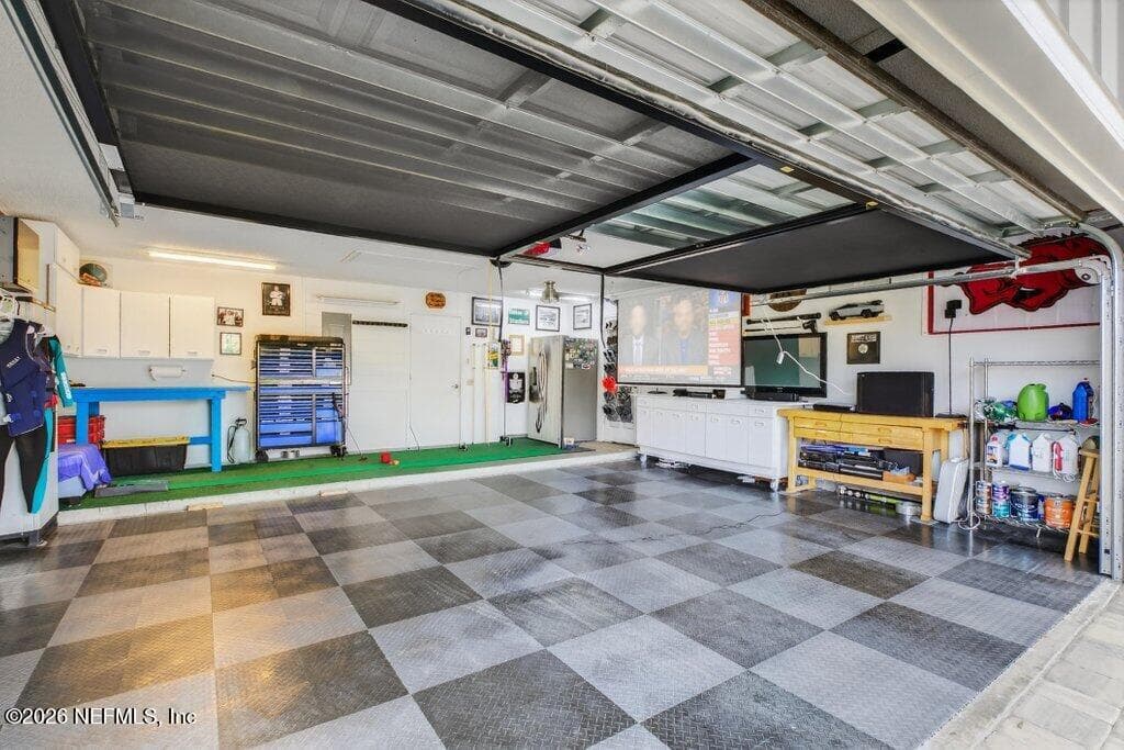 Race track flooring, perfect for a man cave. — 258 BUSH Court, Green Cove Springs, FL 32043
