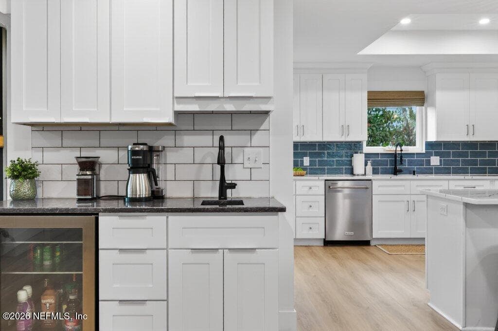 Coffee bar sink dispenses filtered water. Mini fridge for coffee accessories, sodas, or wine. — 258 BUSH Court, Green Cove Springs, FL 32043
