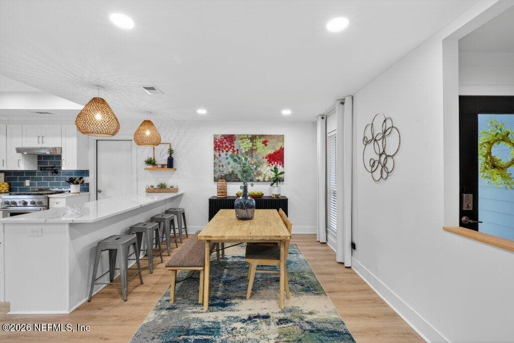 Client removed walls, put in beams to open up the space between kitchen and dining. — 258 BUSH Court, Green Cove Springs, FL 32043