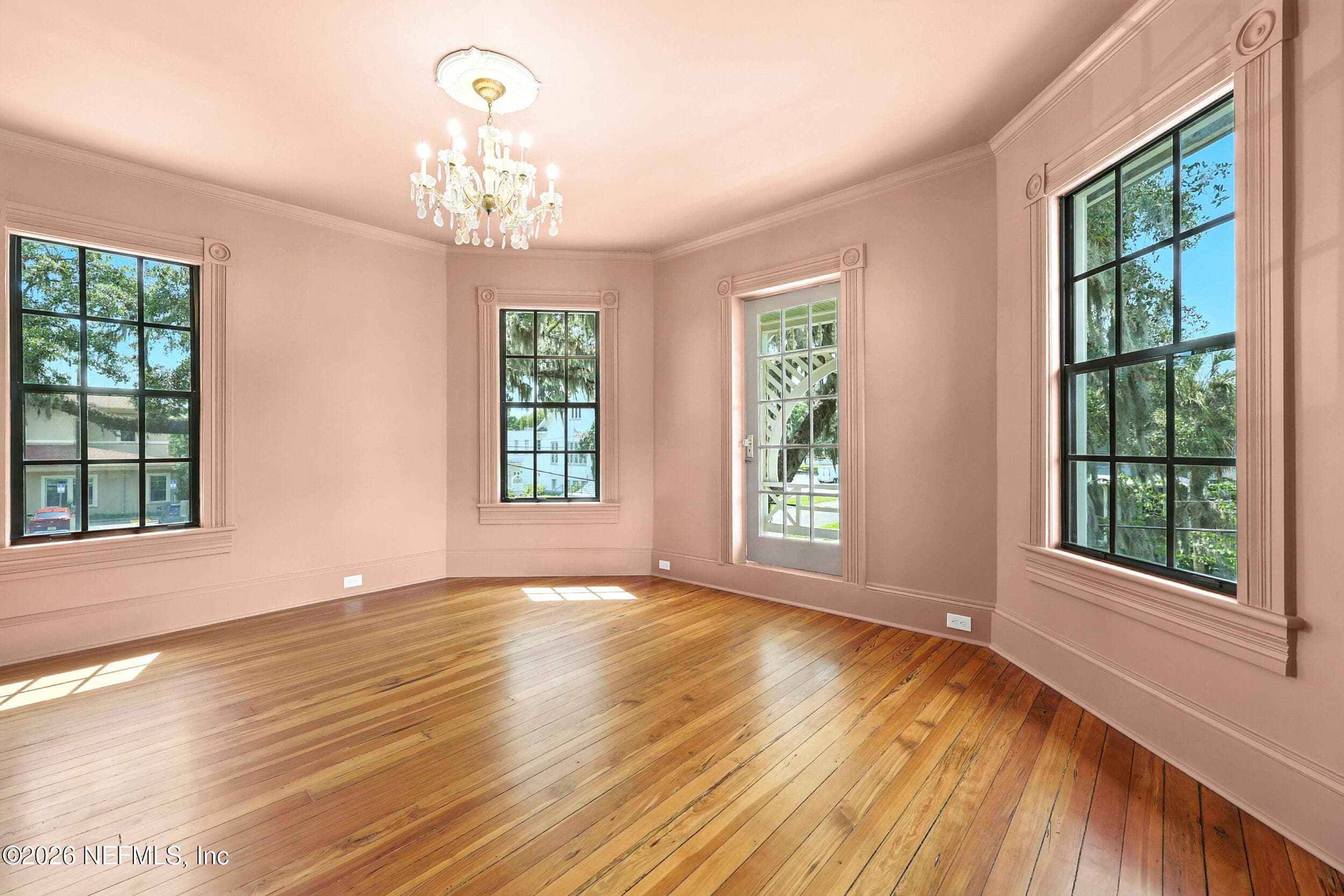Bedroom 4 with balcony in Sherwin Williams Glamour — 700 WALNUT Street, Green Cove Springs, FL 32043