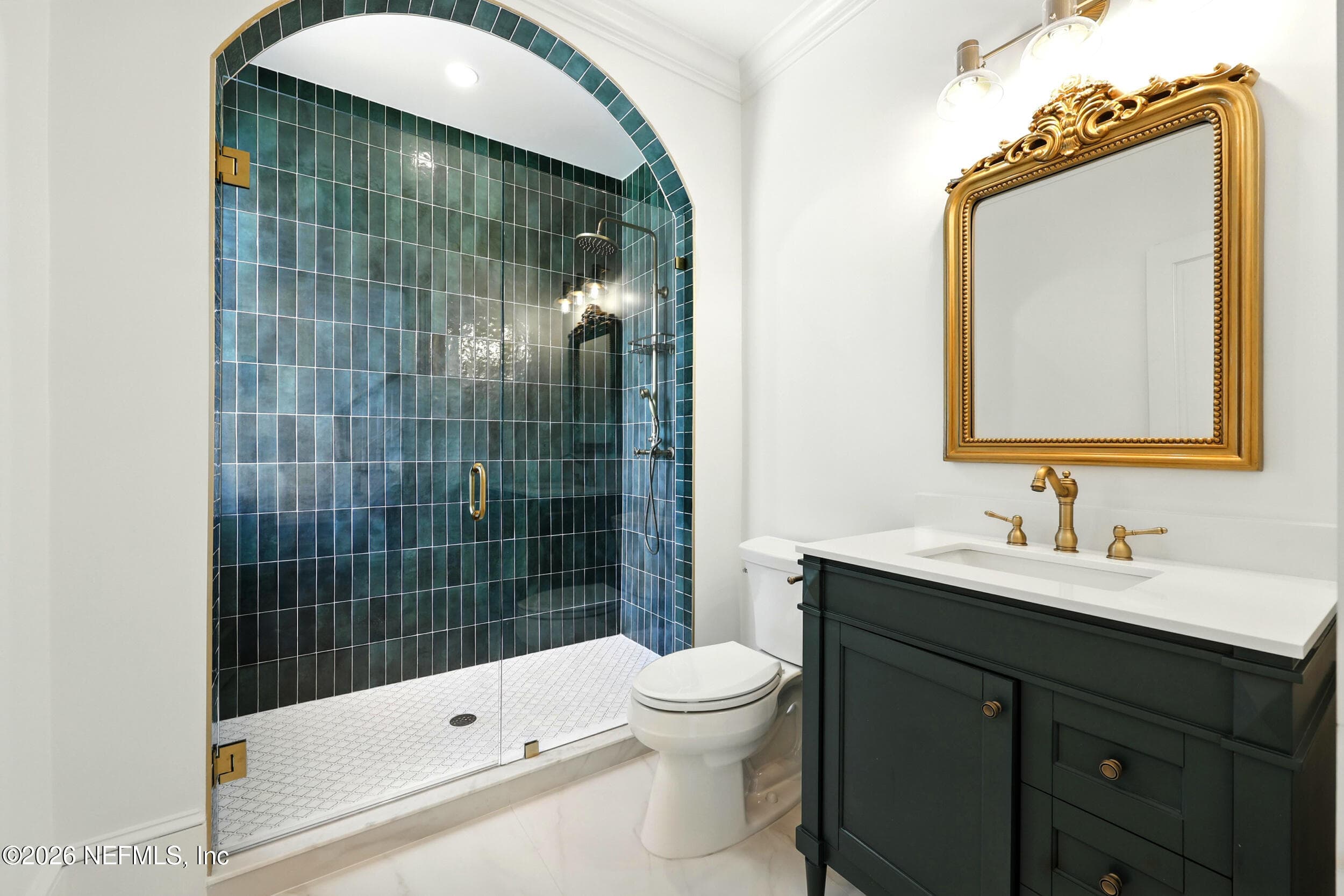Downstairs full bathroom with arch feature — 700 WALNUT Street, Green Cove Springs, FL 32043