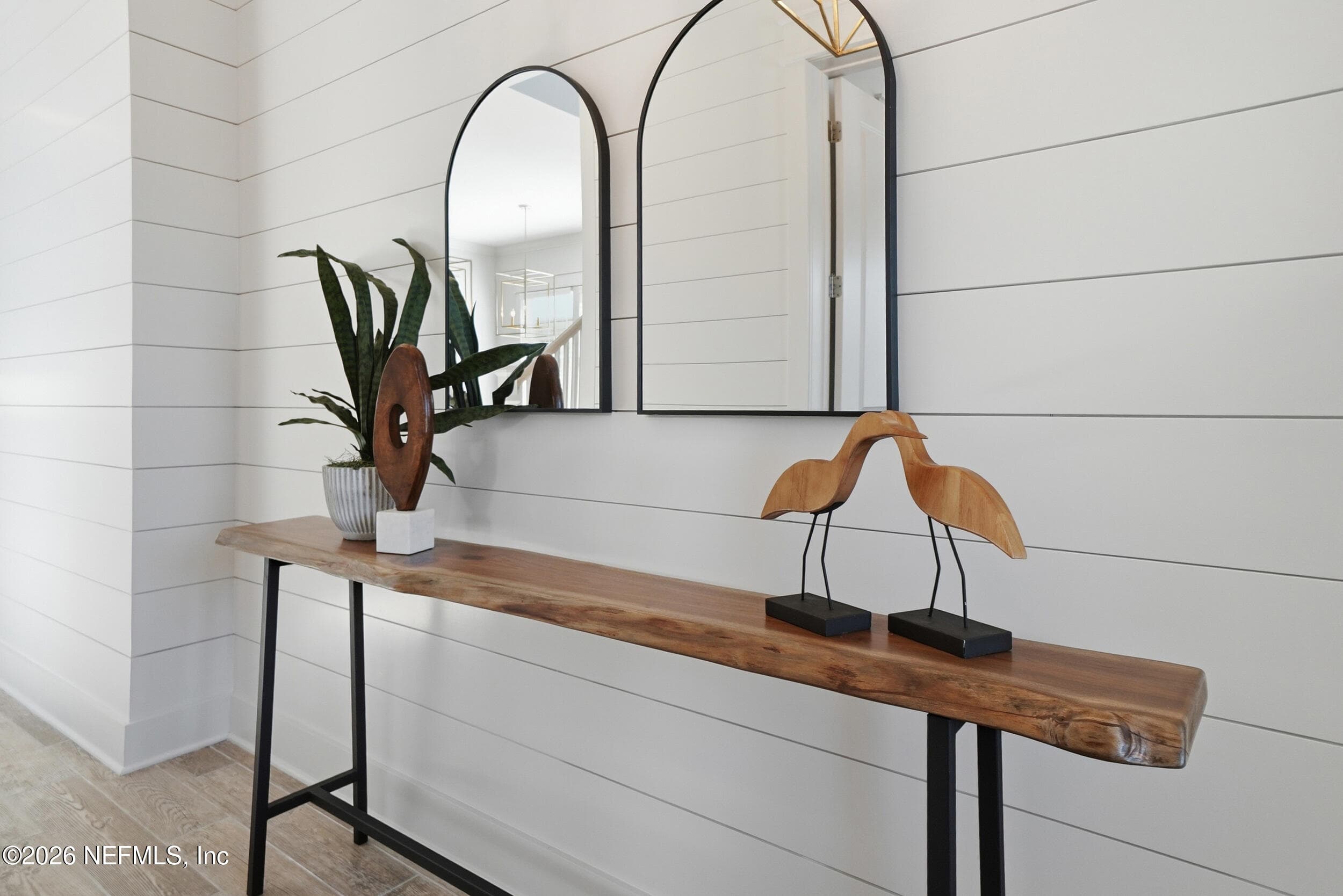 Shiplap walls and sprawling wood-look tile floor. — 1804 ATLANTIC BEACH Drive, Atlantic Beach, FL 32233