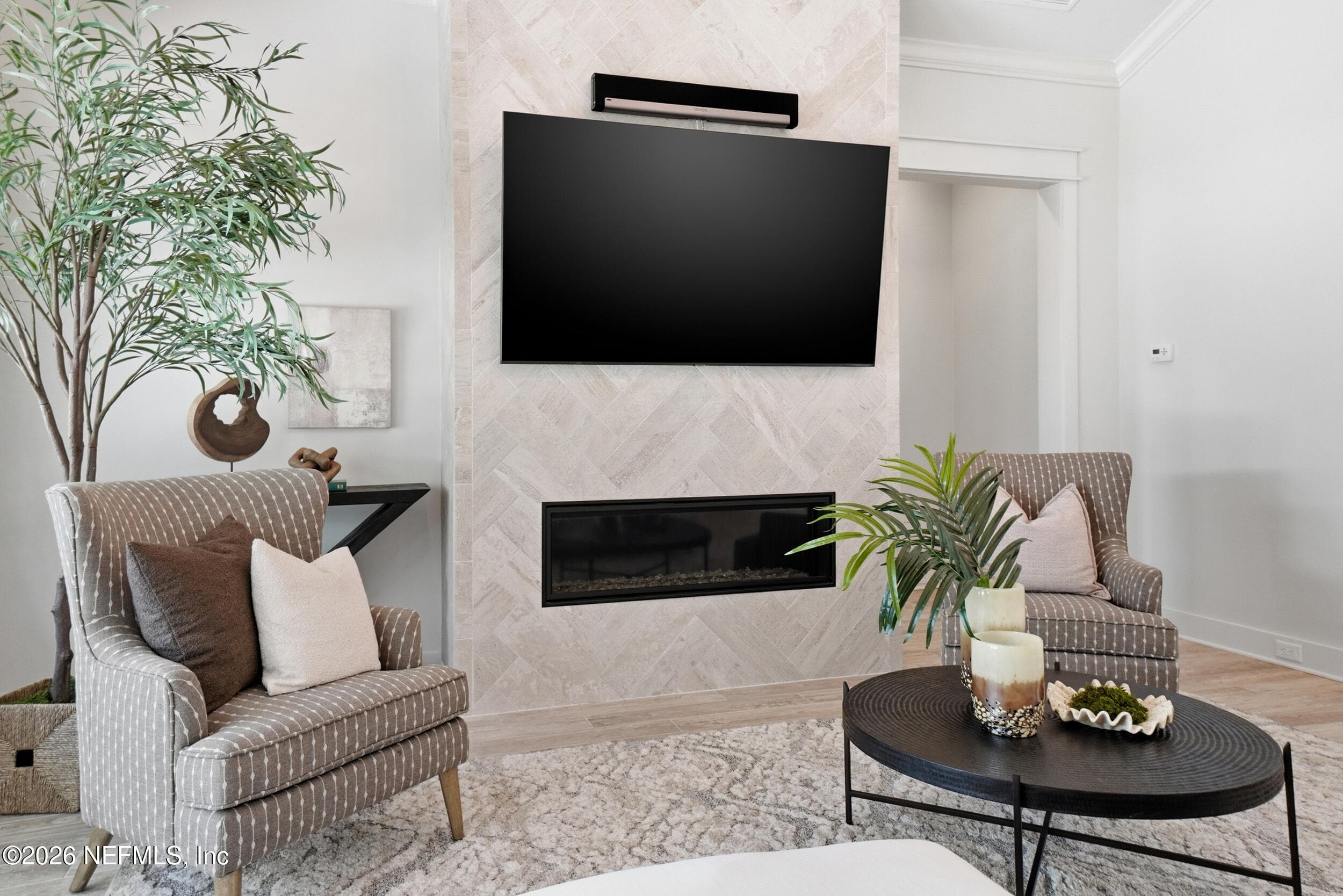 Stunning Gas Fireplace accented with Herringbone patterned Tile — 1804 ATLANTIC BEACH Drive, Atlantic Beach, FL 32233
