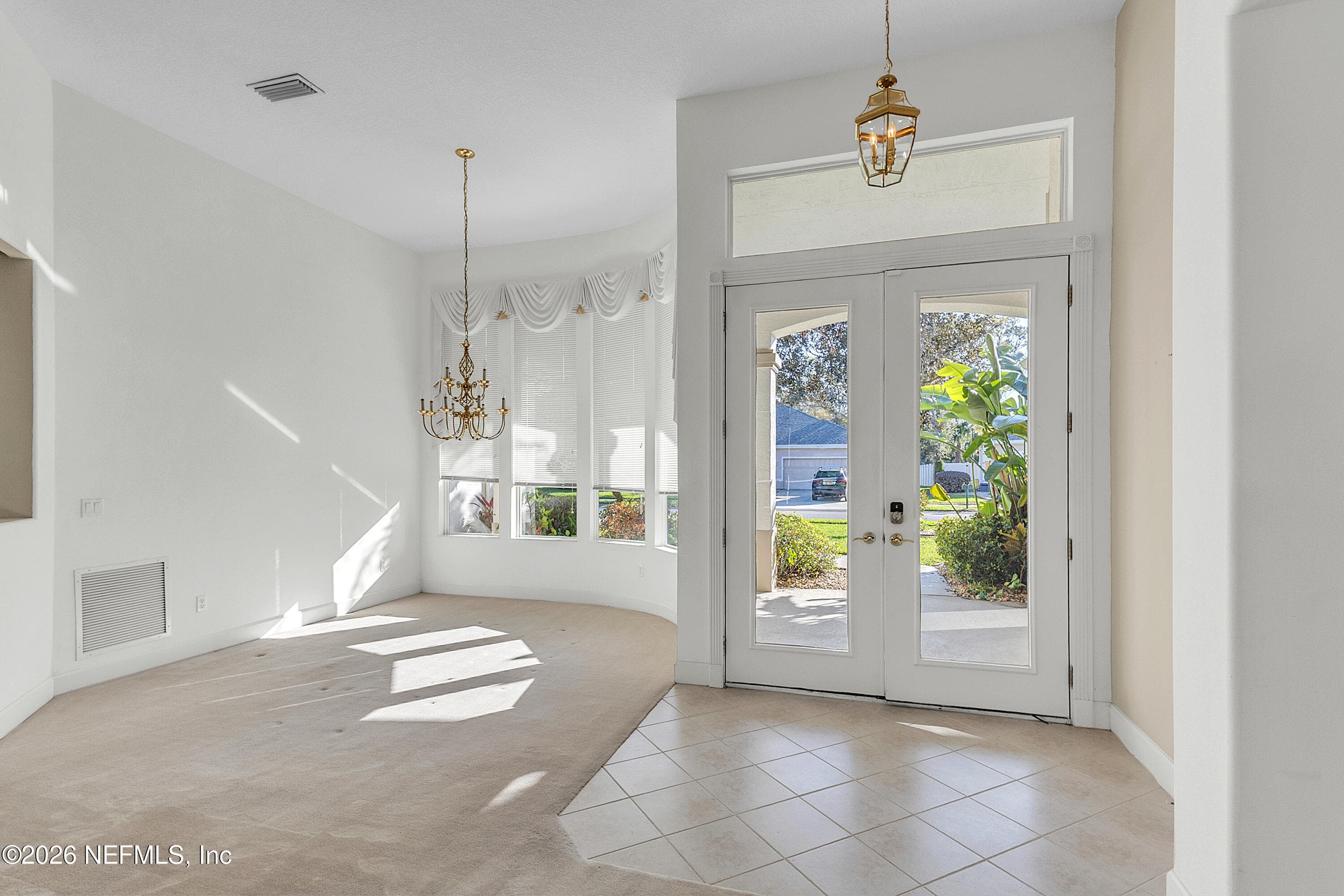 Main entrance and formal Dining — 6030 SANCTUARY GARDEN Boulevard, Port Orange, FL 32128