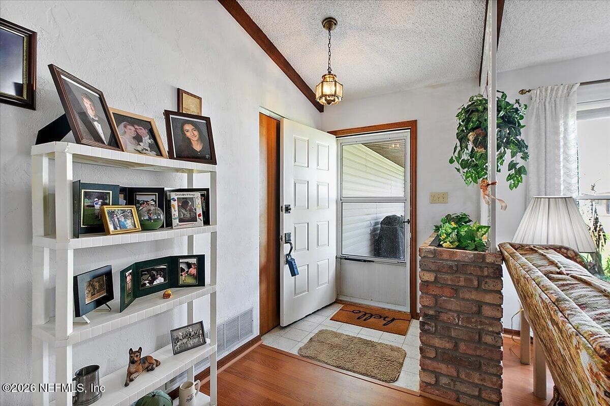 Foyer - Enter through the covered front porch — 21 WESTFORD Lane, Palm Coast, FL 32164
