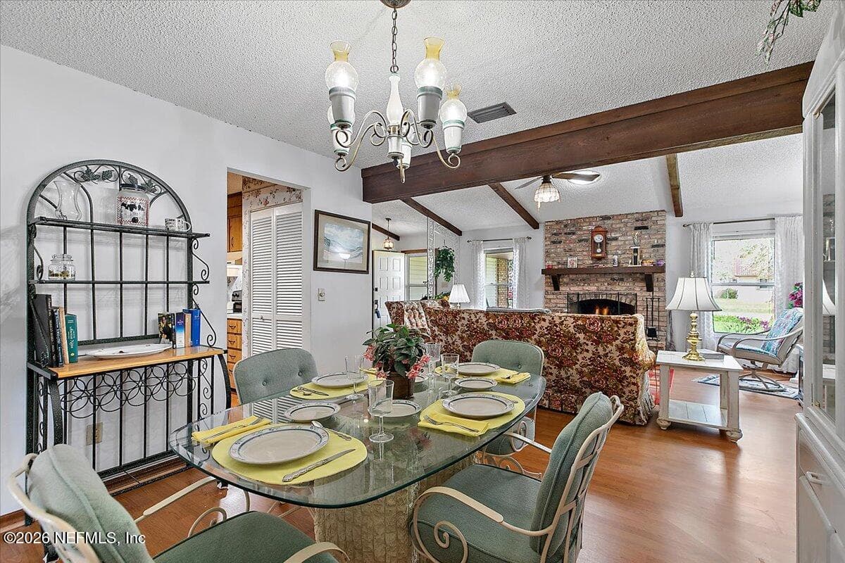 Formal Dining flows directly into the Living Room — 21 WESTFORD Lane, Palm Coast, FL 32164