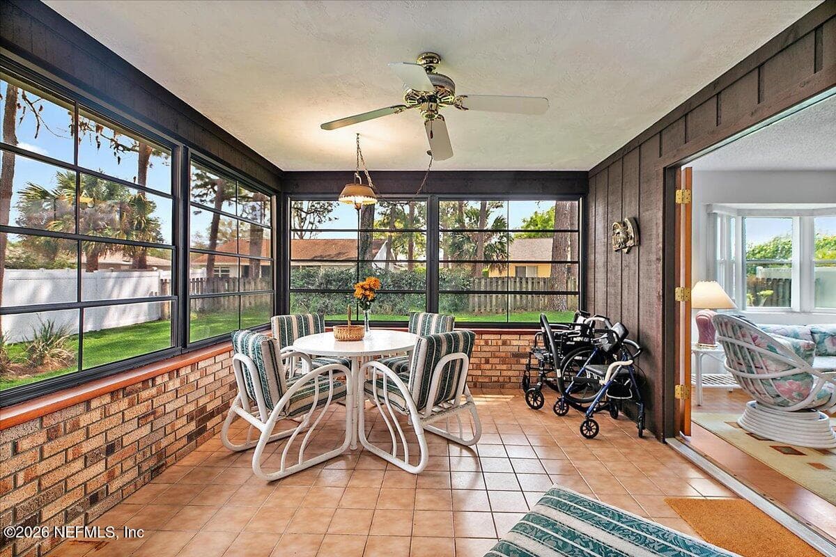 All Weather Porch filled with light the perfect spot for Canasta, or Bridge. — 21 WESTFORD Lane, Palm Coast, FL 32164