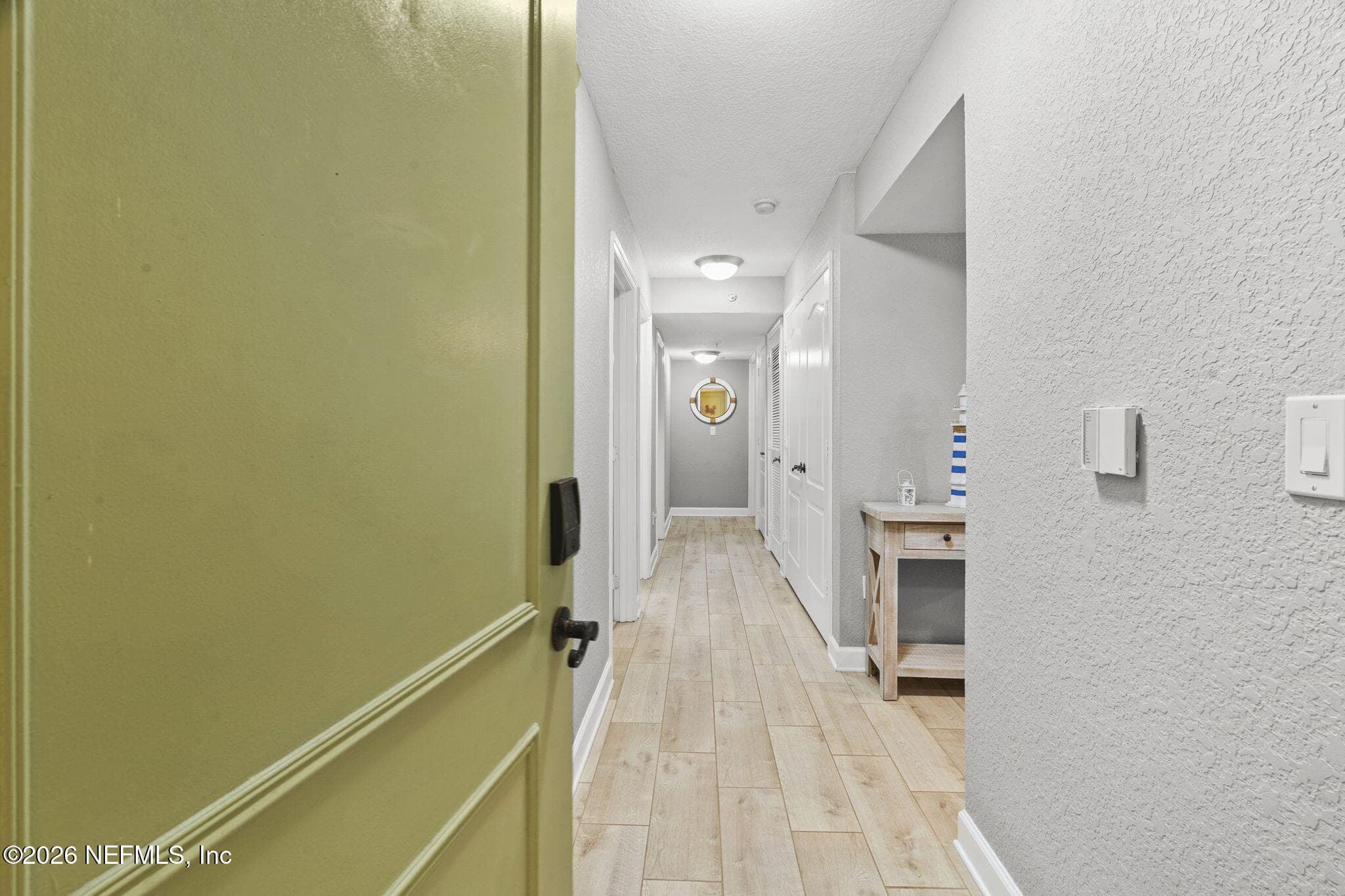 Entry way is next to an exterior beach storage closet — 105 25TH Avenue S L11, Jacksonville Beach, FL 32250
