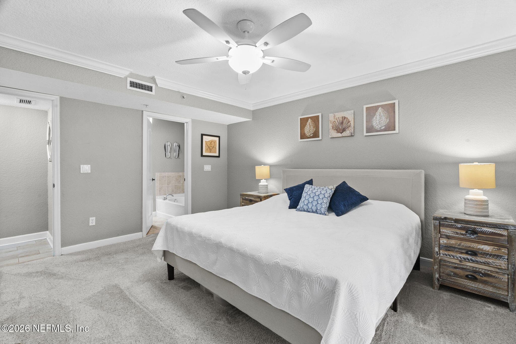 Primary bedroom with ensuite and large walk-in closet — 105 25TH Avenue S L11, Jacksonville Beach, FL 32250