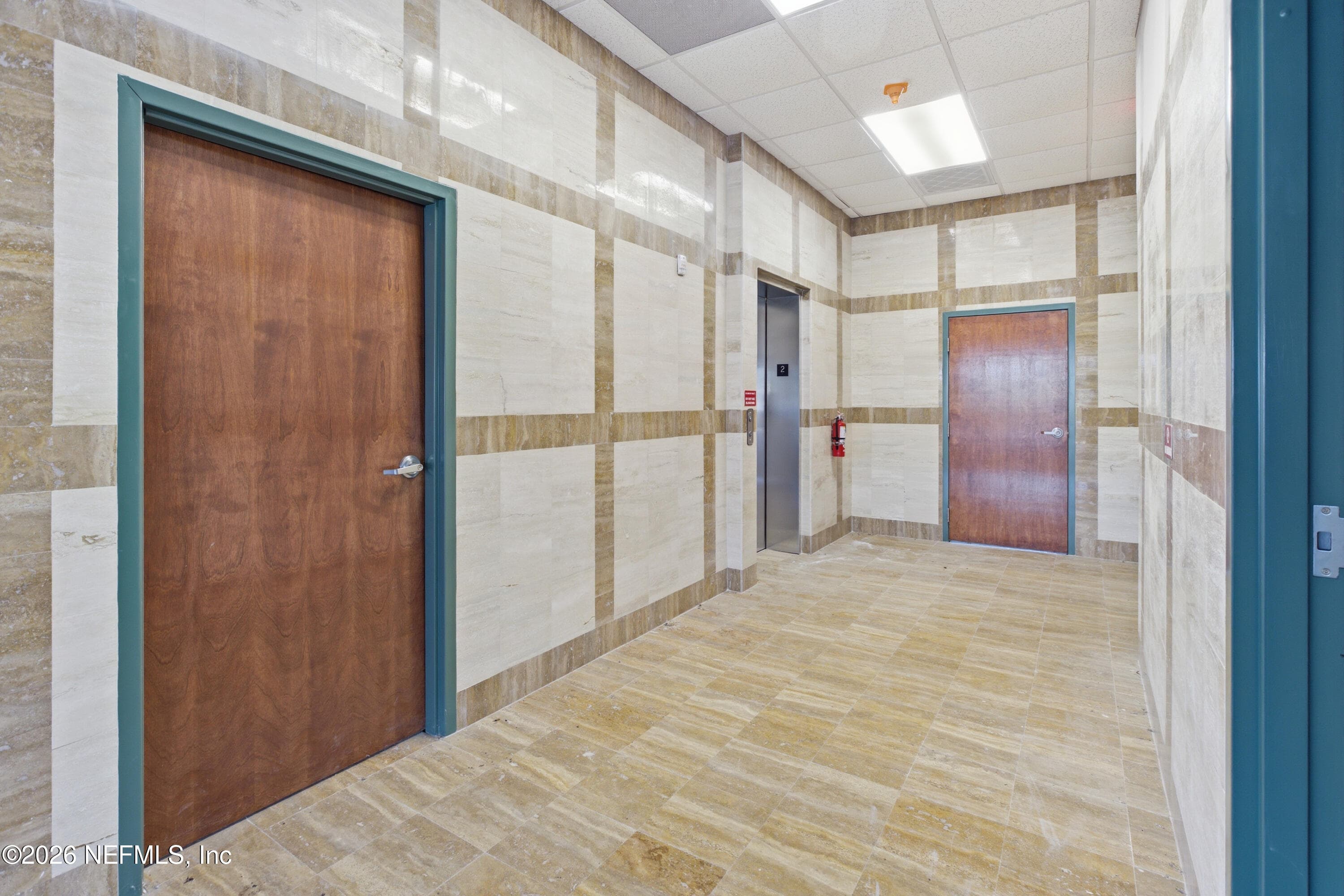where is elevator is located on 2nd floor — 430 COLLEGE Drive 200-217, Middleburg, FL 32068