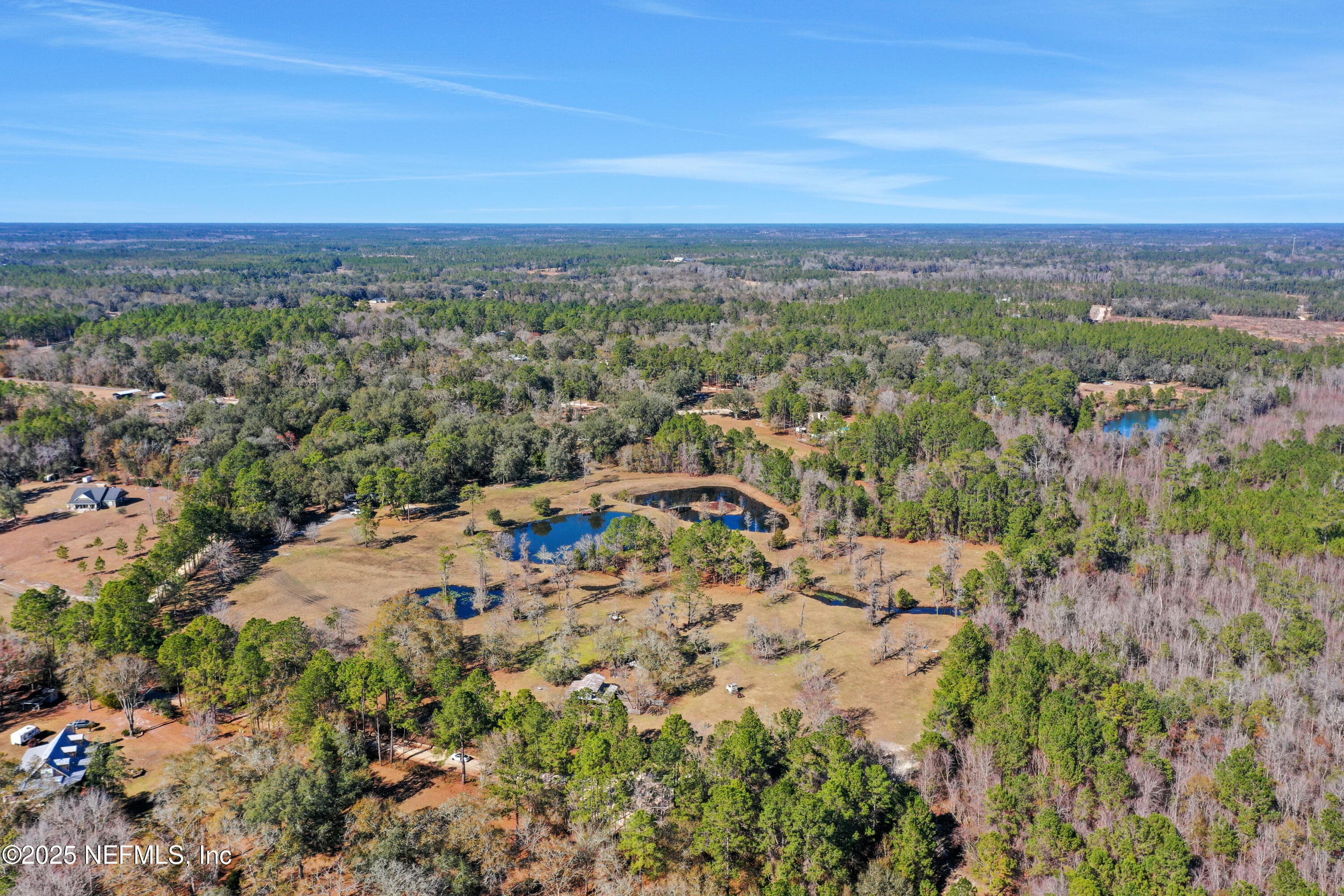 ponds are the neighbors and homes — 6769 SANDSDALE Road, Macclenny, FL 32063
