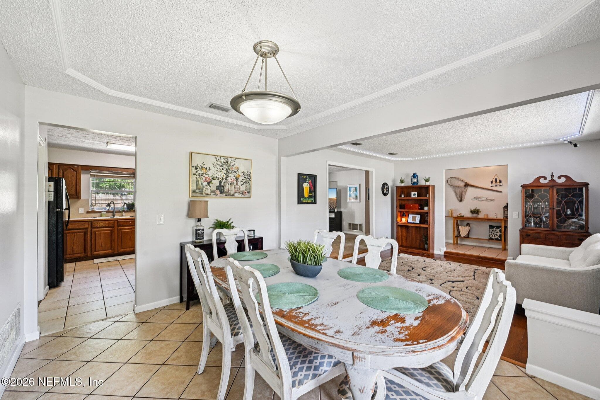 Dining area connects through the family room and kitchen — 1370 BELLAIR Boulevard, Orange Park, FL 32073