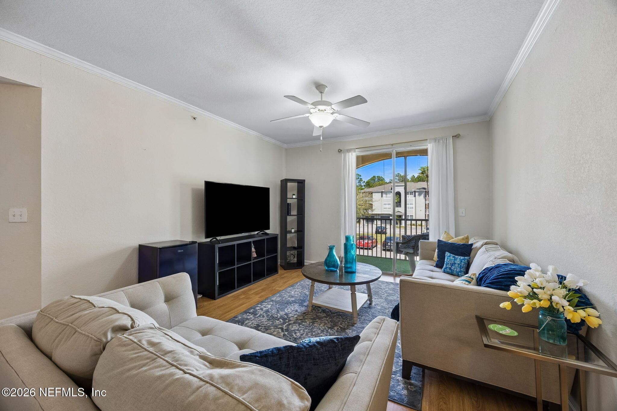 Large main living area with an open concept and sliding glass doors perfect for entertaining — 440 S VILLA SAN MARCO Drive 201, St. Augustine, FL 32086