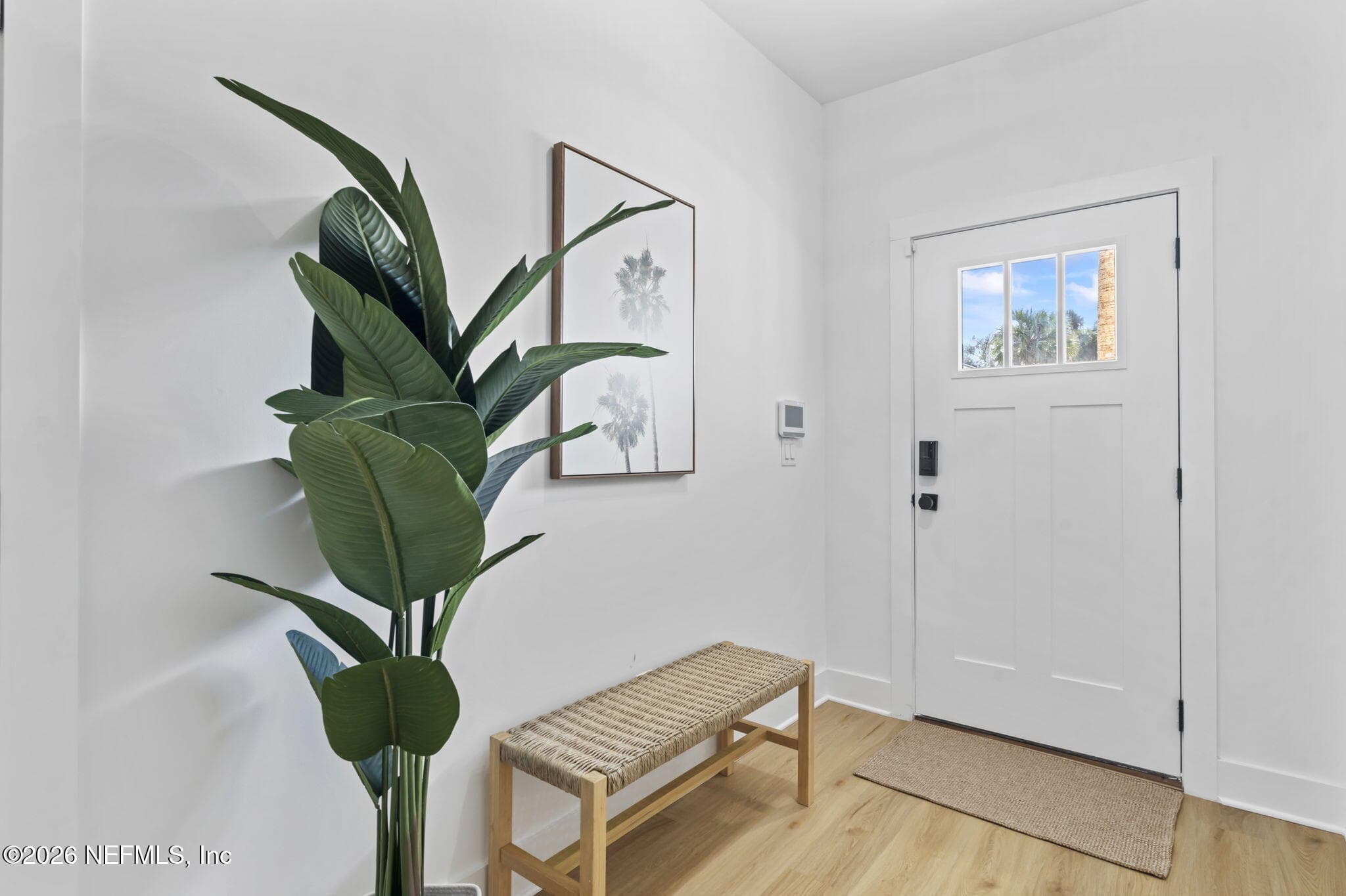 Kwikset Home Connect Smart Door lock and craftsman style doors and trim throughout — 921 2ND Avenue S, Jacksonville Beach, FL 32250