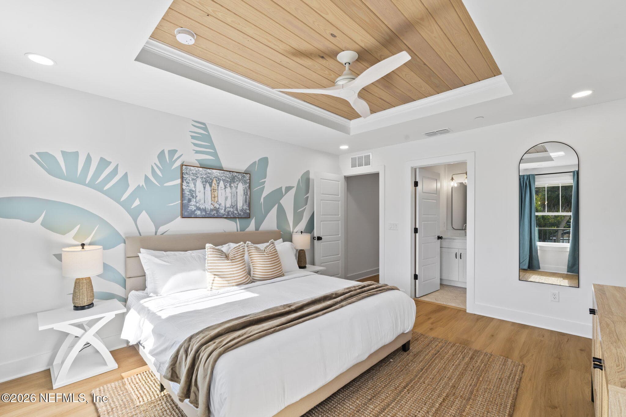 Primary bedroom with tongue and groove ceiling and ventilated wood shelving systems in ALL closets — 921 2ND Avenue S, Jacksonville Beach, FL 32250