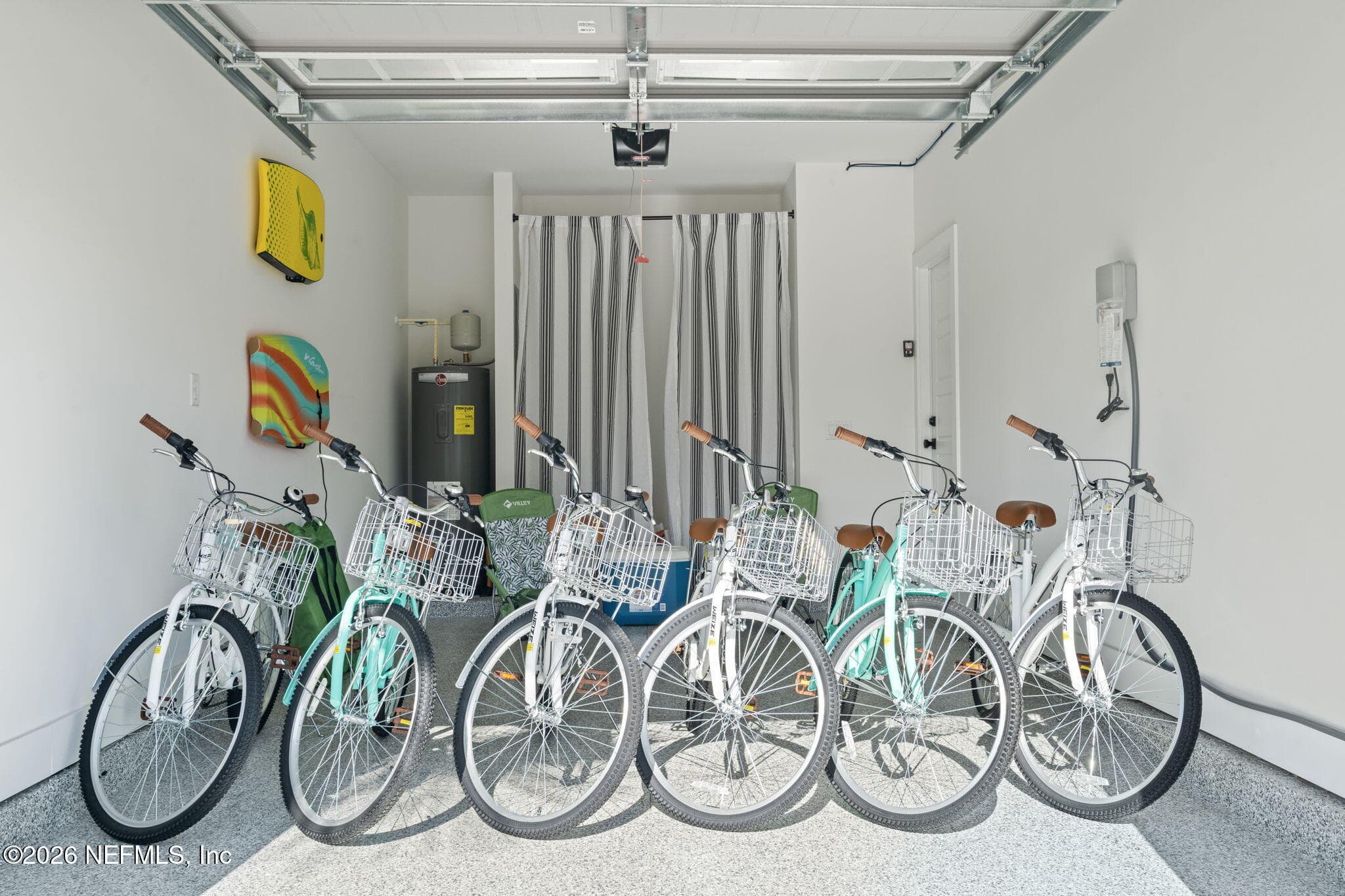 Garage features hybrid epoxy basecoat full flake broadcast
(gravel) & polyaspartic topcoat — 923 2ND Avenue S, Jacksonville Beach, FL 32250