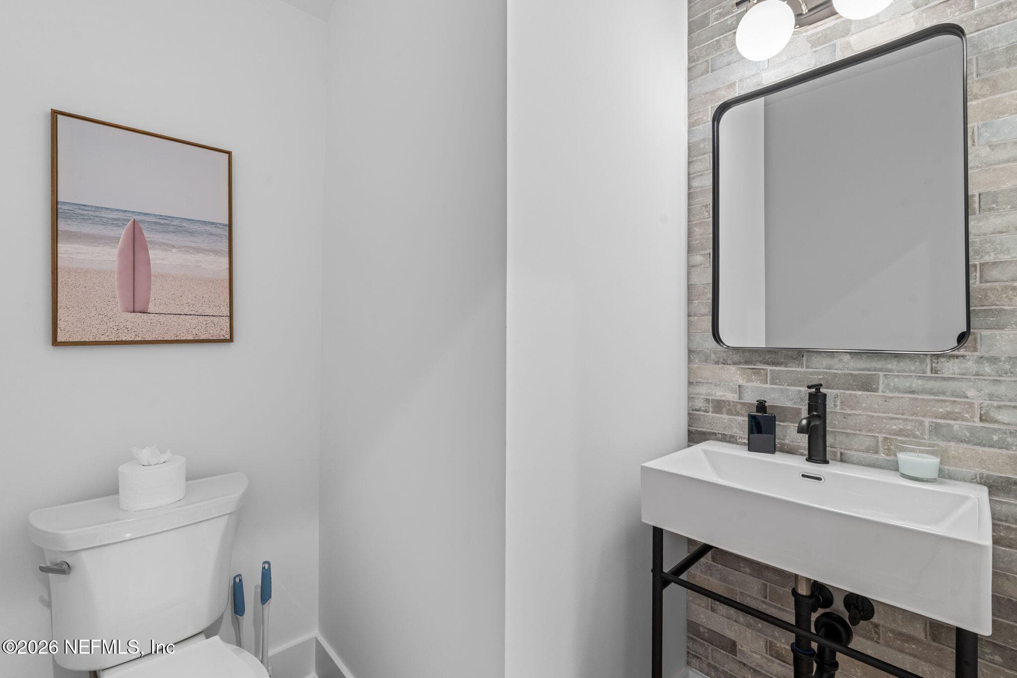 Powder Bath with tile feature wall — 923 2ND Avenue S, Jacksonville Beach, FL 32250