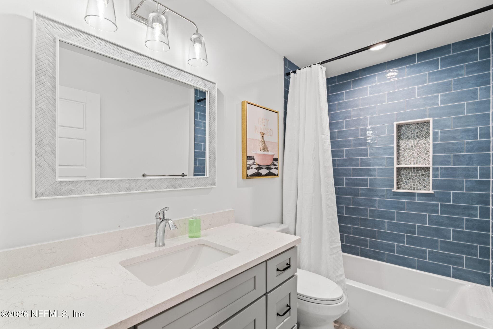 Full bath with Upgraded Kohler tub and designer tile — 923 2ND Avenue S, Jacksonville Beach, FL 32250