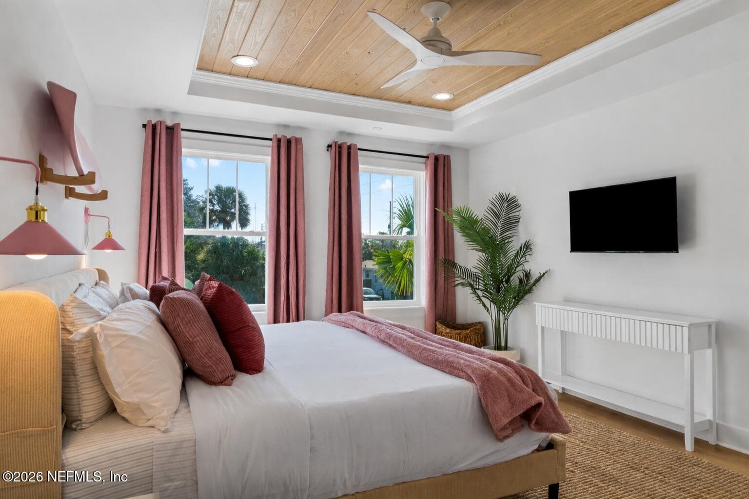 Primary bedroom with tongue and groove ceiling and ventilated wood shelving systems in ALL closets — 923 2ND Avenue S, Jacksonville Beach, FL 32250
