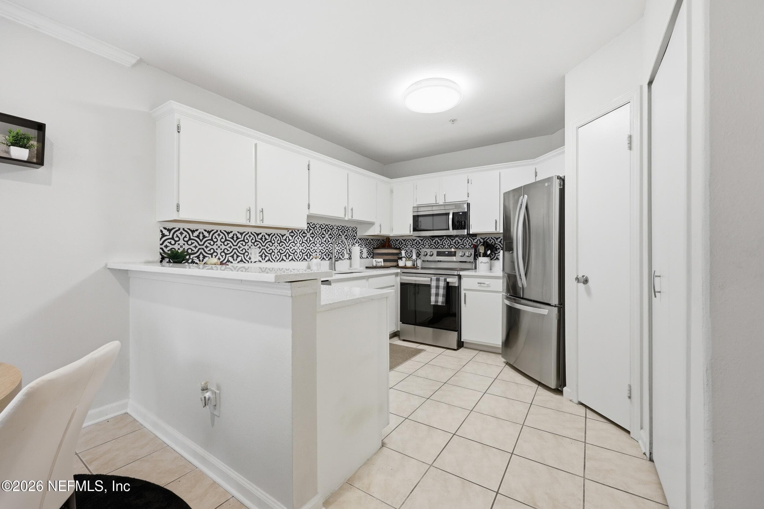 Photo 11 of 1701 THE GREENS Way 1913, Jacksonville Beach, FL 32250
