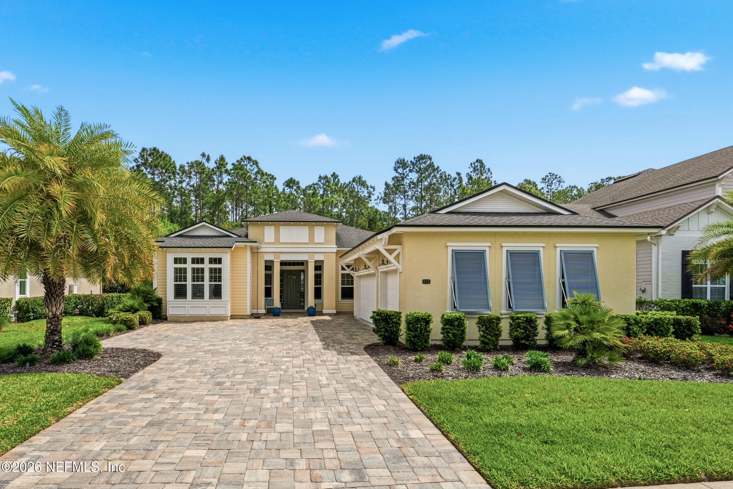 Daytime front 3-car garage — 323 MAHI Drive, Ponte Vedra, FL 32081