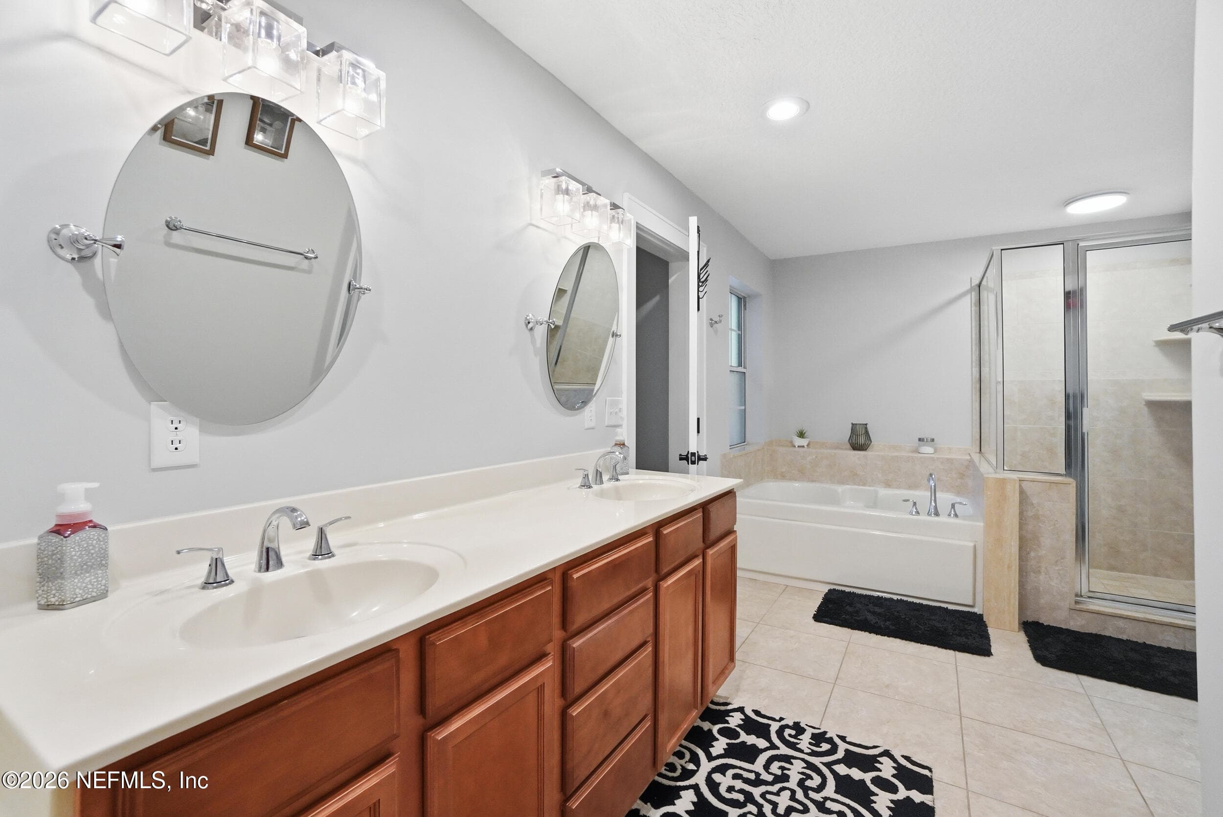 Upgraded mirrors in Master bath — 2408 STOCKTON Drive, Fleming Island, FL 32003