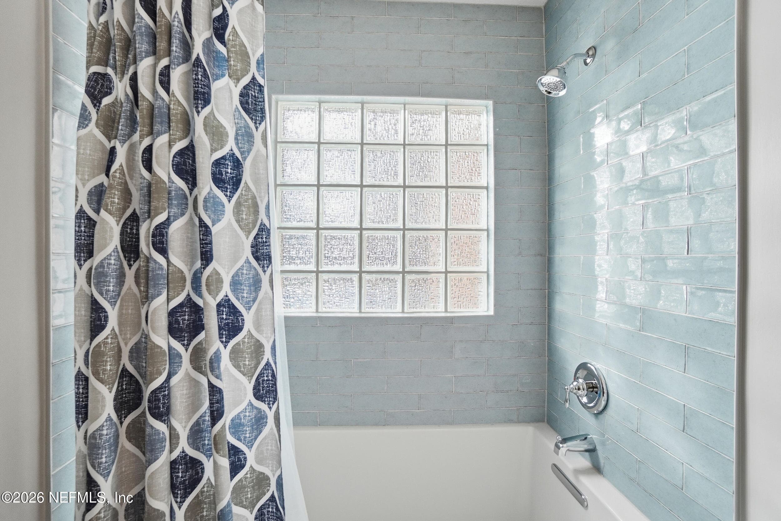 Shower with updated tile — 2408 STOCKTON Drive, Fleming Island, FL 32003