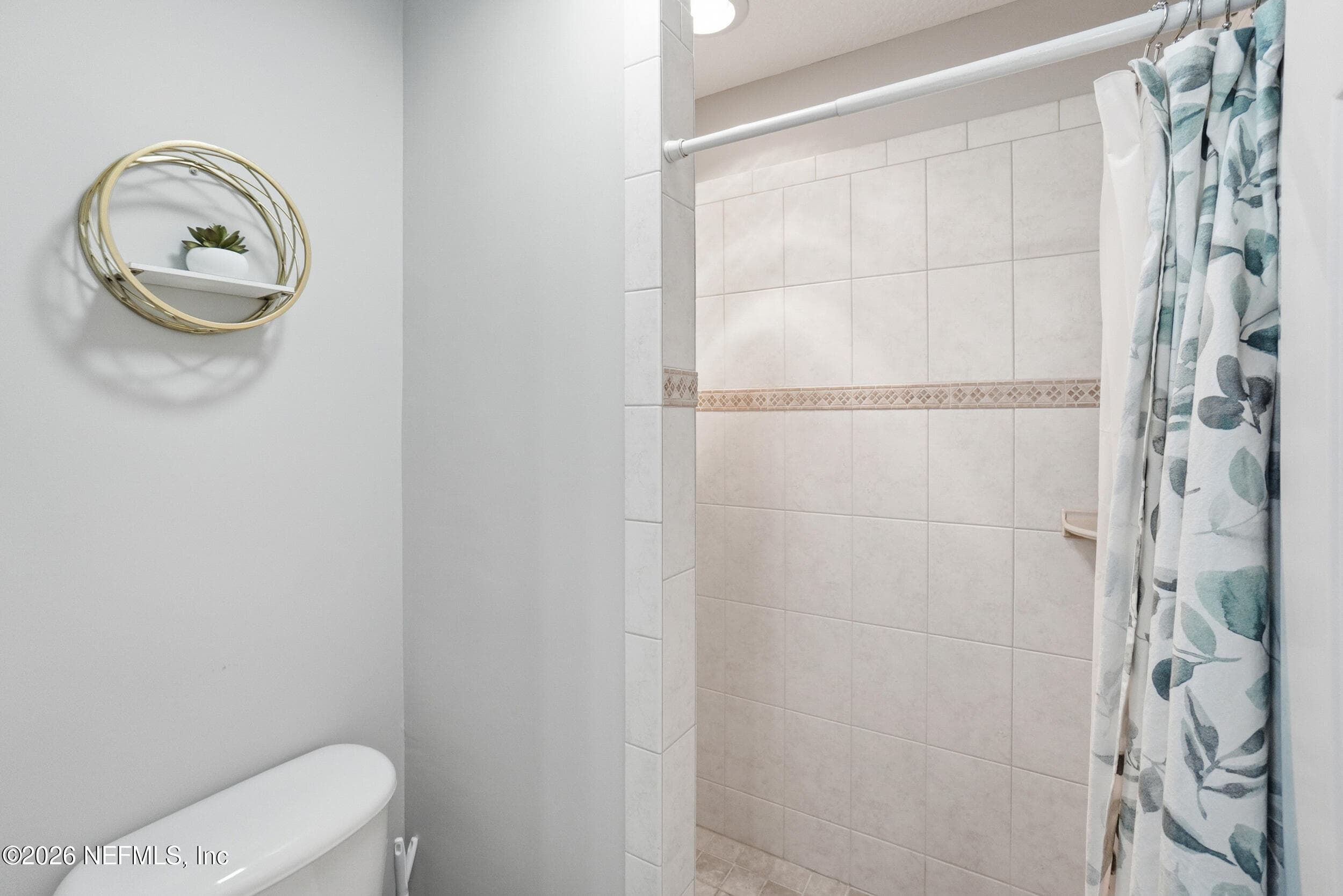 Jack and Jill bathroom with separate shower — 2408 STOCKTON Drive, Fleming Island, FL 32003