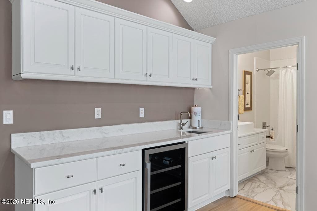 upstairs kitchenette area with marble counter — 1943 ROSE MALLOW Lane, Fleming Island, FL 32003