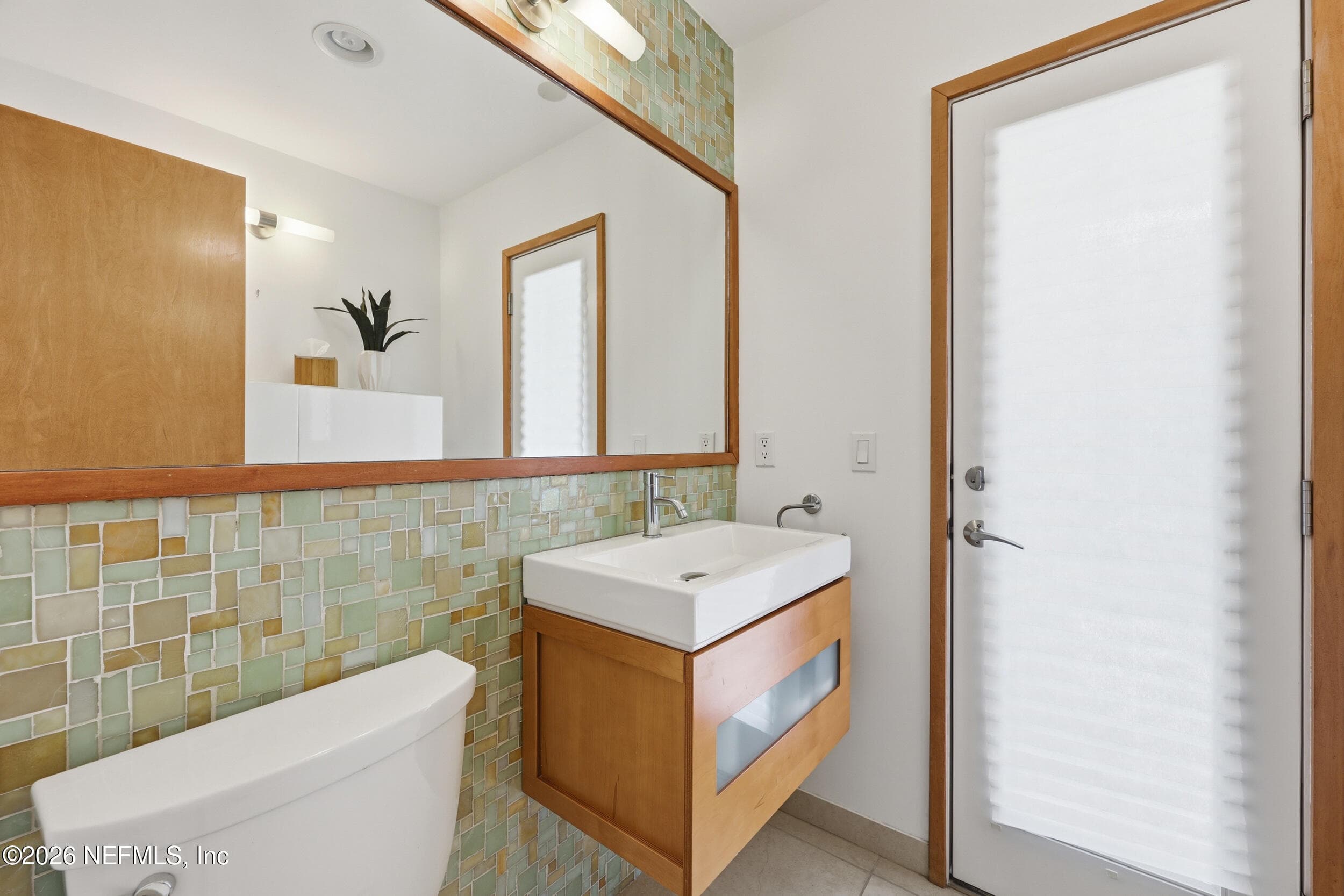 Guest bathroom and also a storm safety room — 8071 PINE LAKE Road, Jacksonville, FL 32256