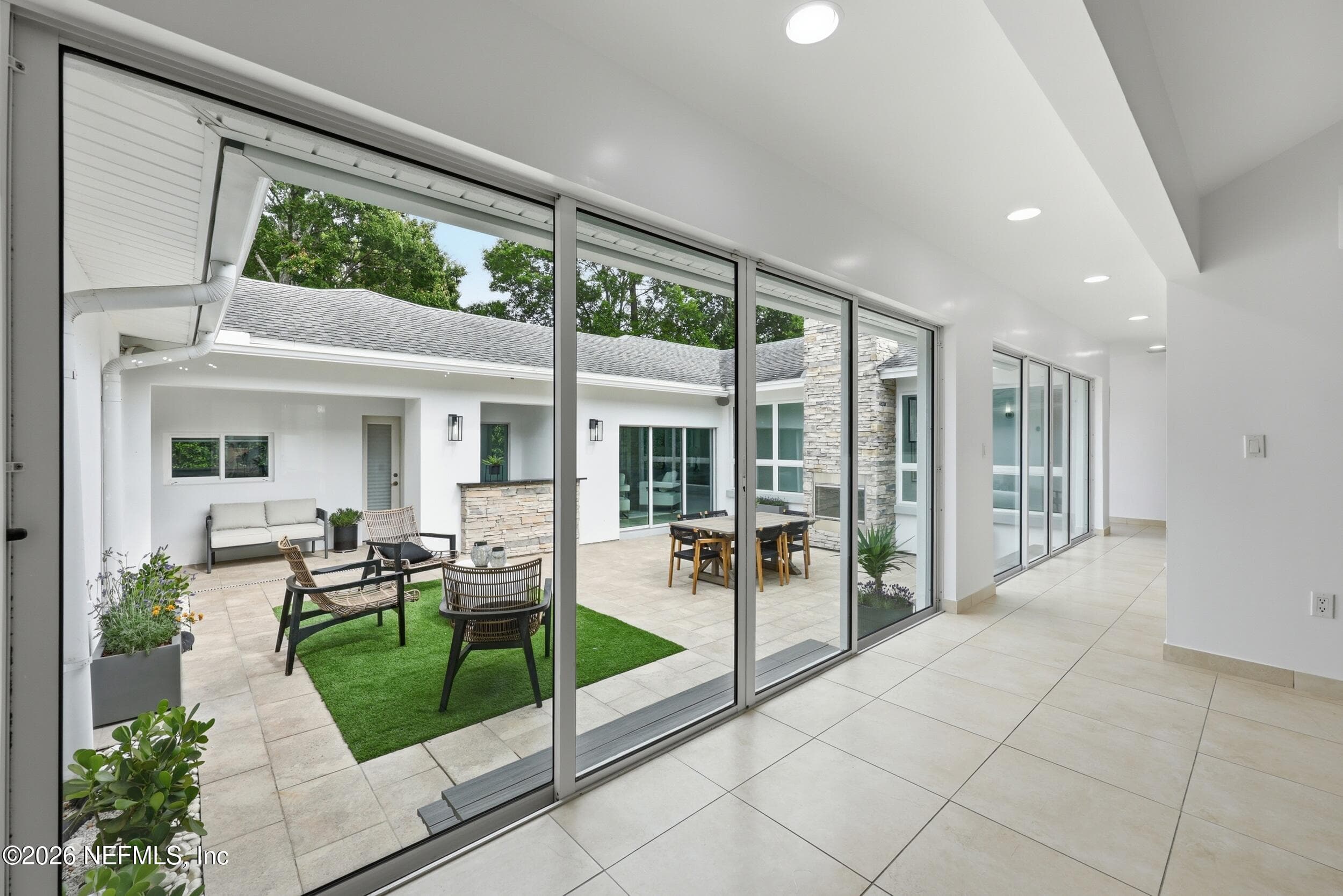 Gorgeous courtyard that is the centerpoint of the home — 8071 PINE LAKE Road, Jacksonville, FL 32256