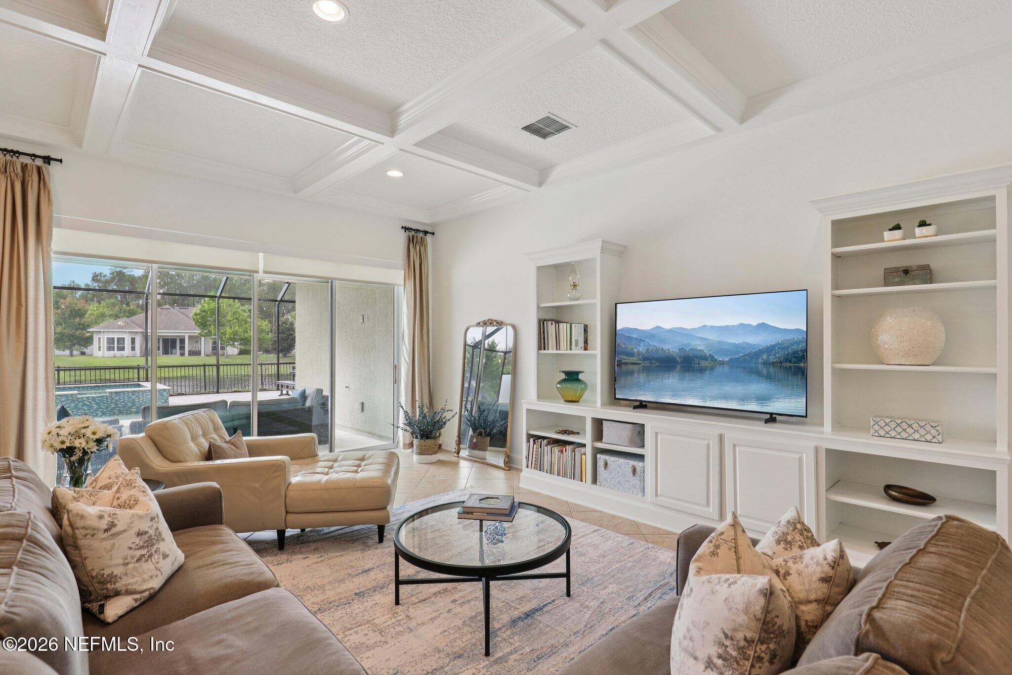 Family room overlooks pool area and has custom coffered ceilings — 529 STATELY SHOALS Trail, Ponte Vedra, FL 32081