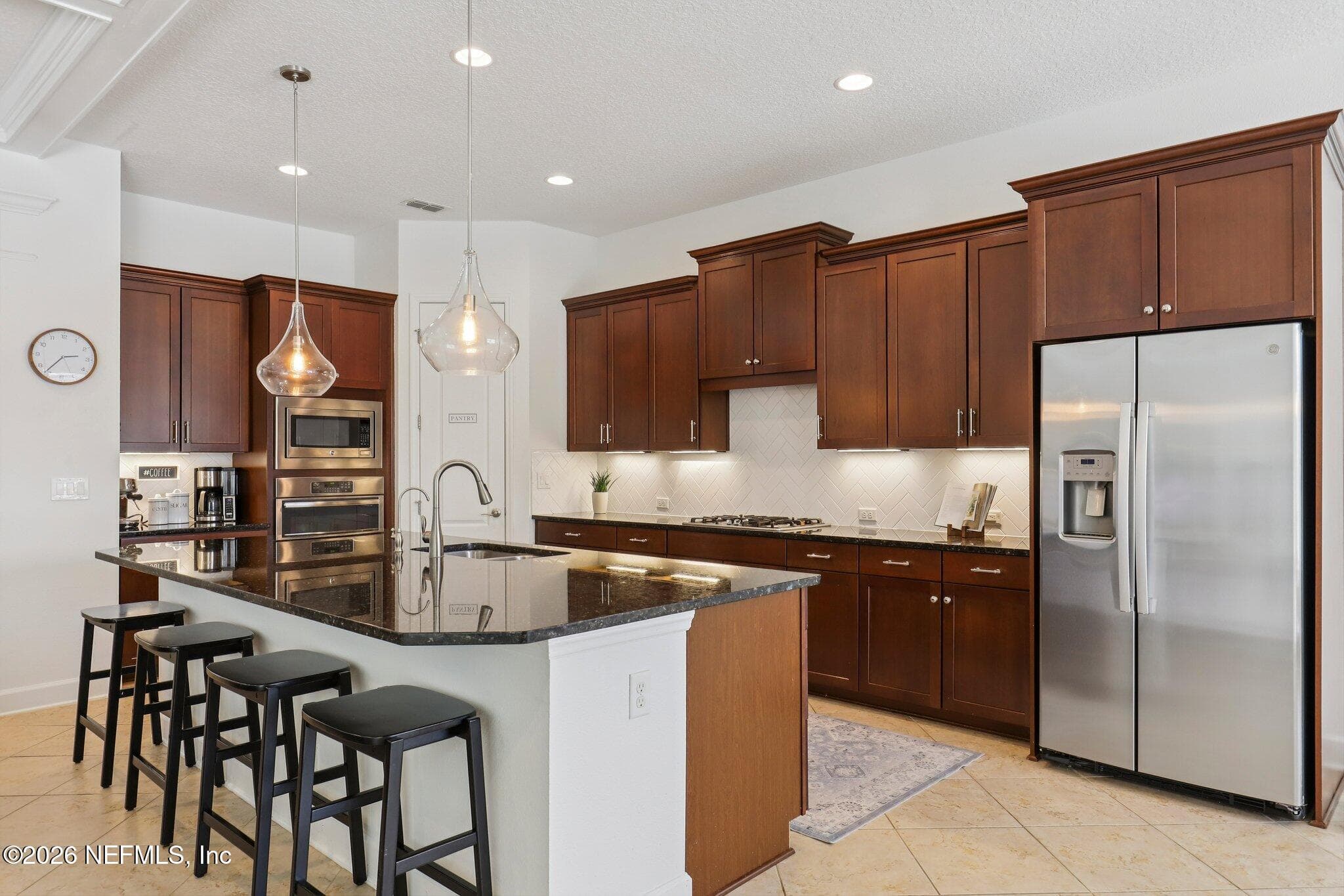 Kitchen has gas range, stainless appliances, and granite counters — 529 STATELY SHOALS Trail, Ponte Vedra, FL 32081