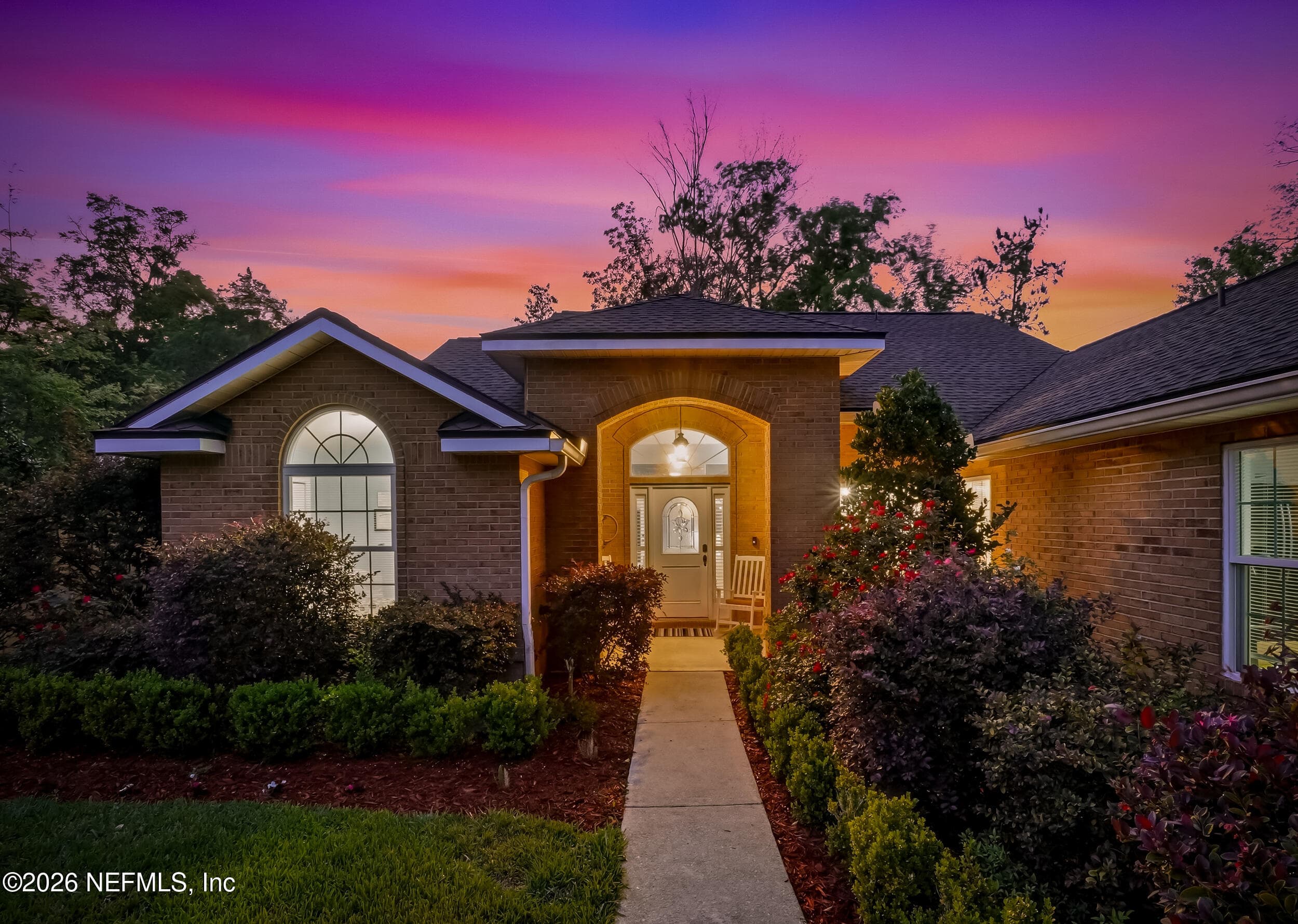 Lush landscaping and entry to the front door — 2408 STOCKTON Drive, Fleming Island, FL 32003