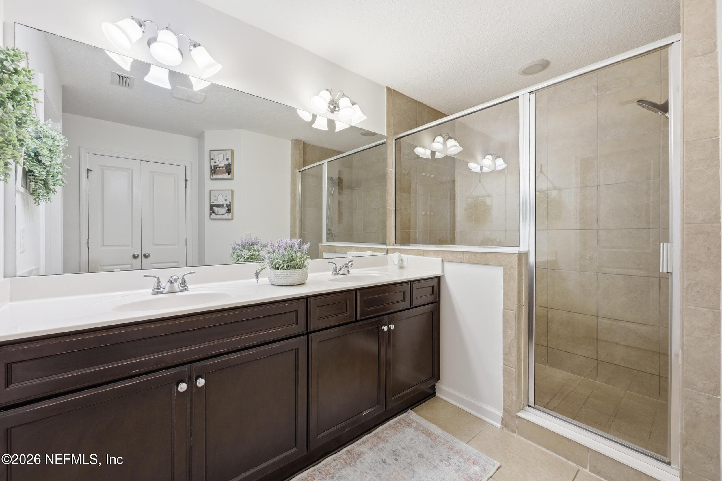 Well-appointed primary bathroom with a clean layout and modern finishes. — 3650 CRESWICK Circle C, Orange Park, FL 32065