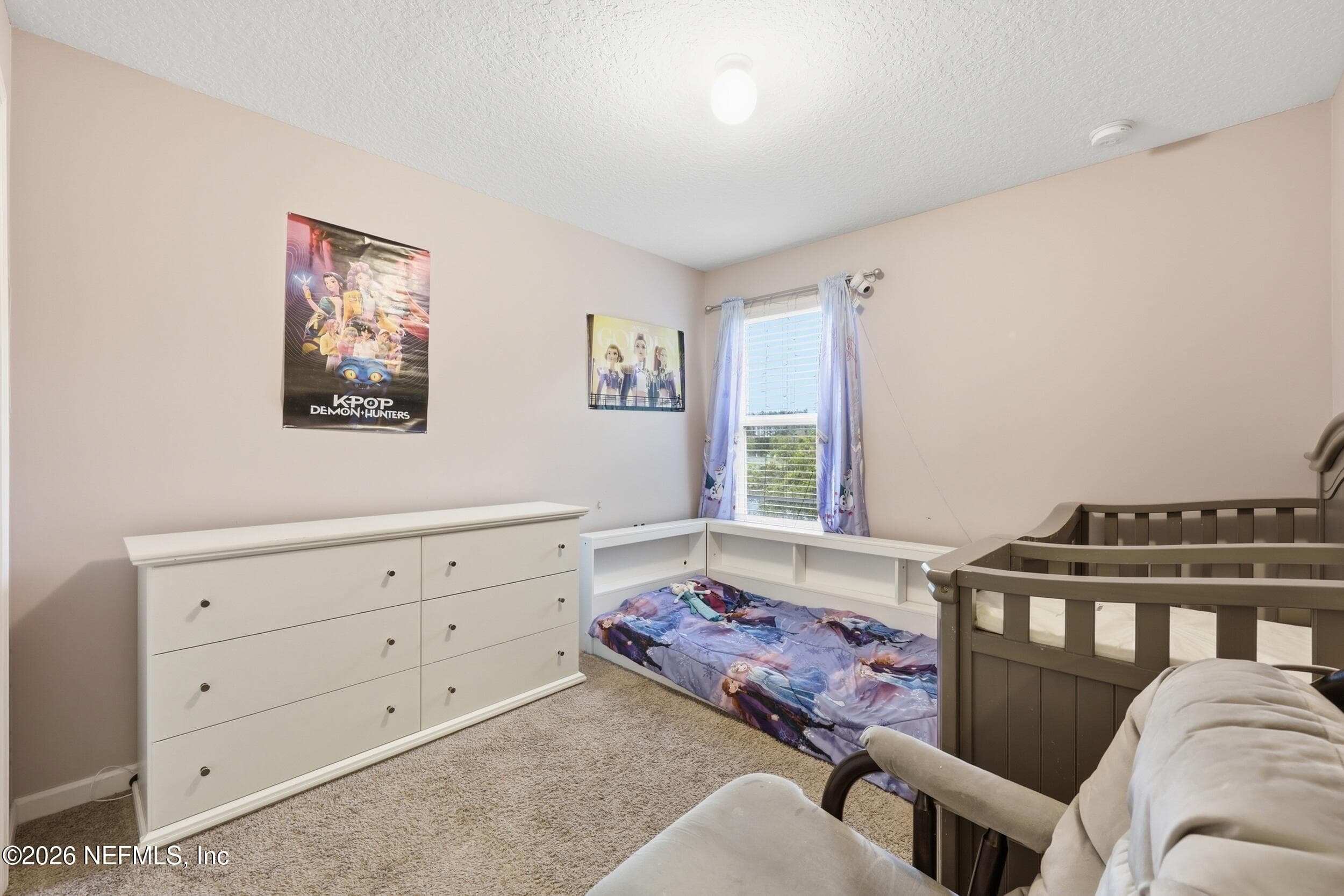 Flexible third bedroom with natural light, perfect for a guest room, office, or hobby space. — 3650 CRESWICK Circle C, Orange Park, FL 32065