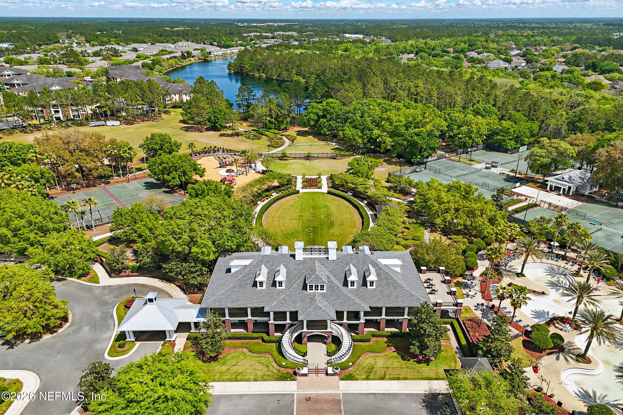 Aerial view of the community clubhouse and amenity center, showcasing the heart of Oakleaf’s lifestyle offerings. — 3650 CRESWICK Circle C, Orange Park, FL 32065