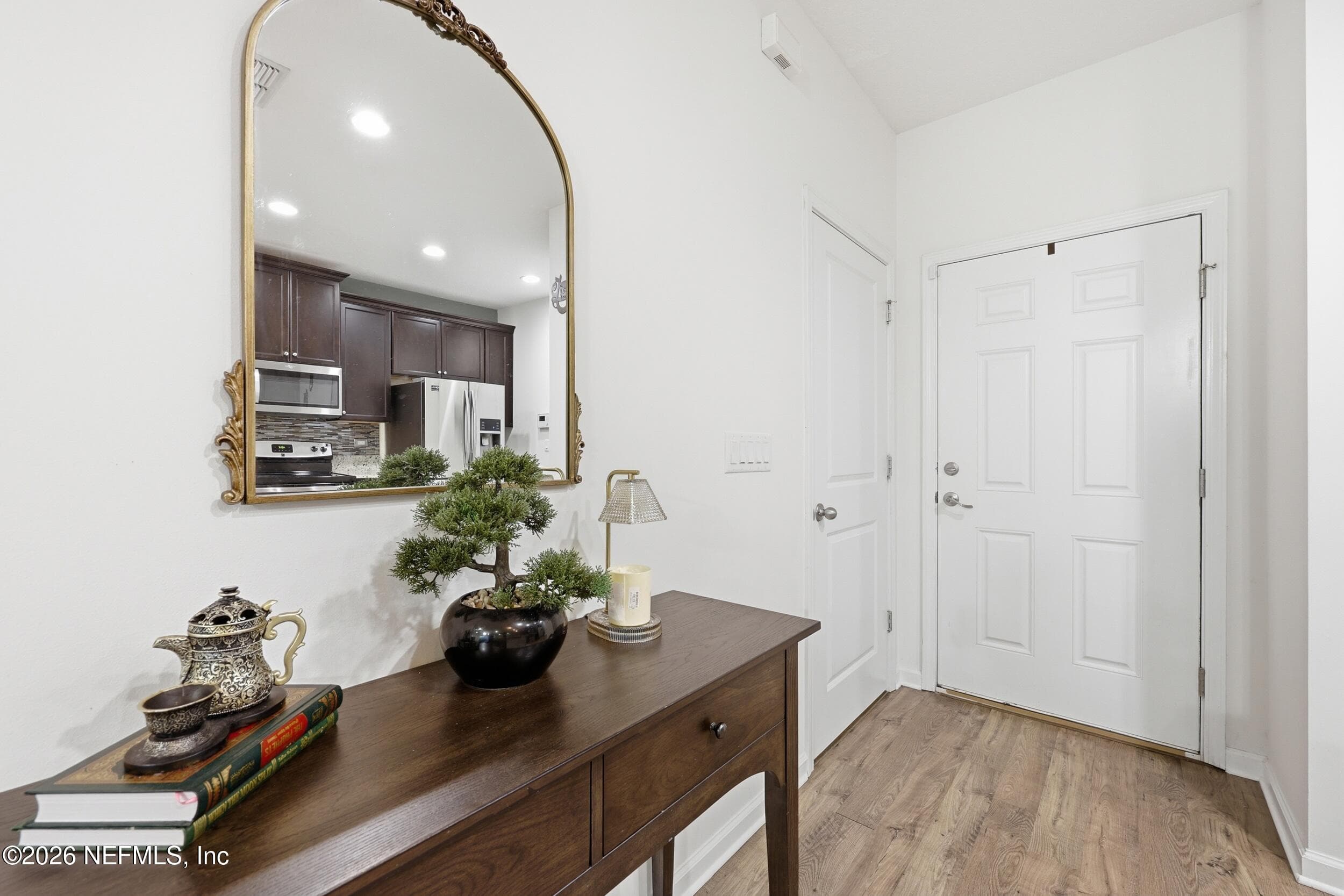 Inviting entry space with clean sightlines to the front door, creating a warm first impression. — 3650 CRESWICK Circle C, Orange Park, FL 32065