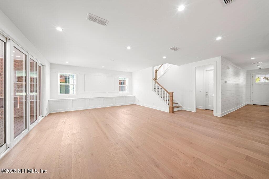 Great room with custom built in storage along wall — 397 PLAZA, Atlantic Beach, FL 32233
