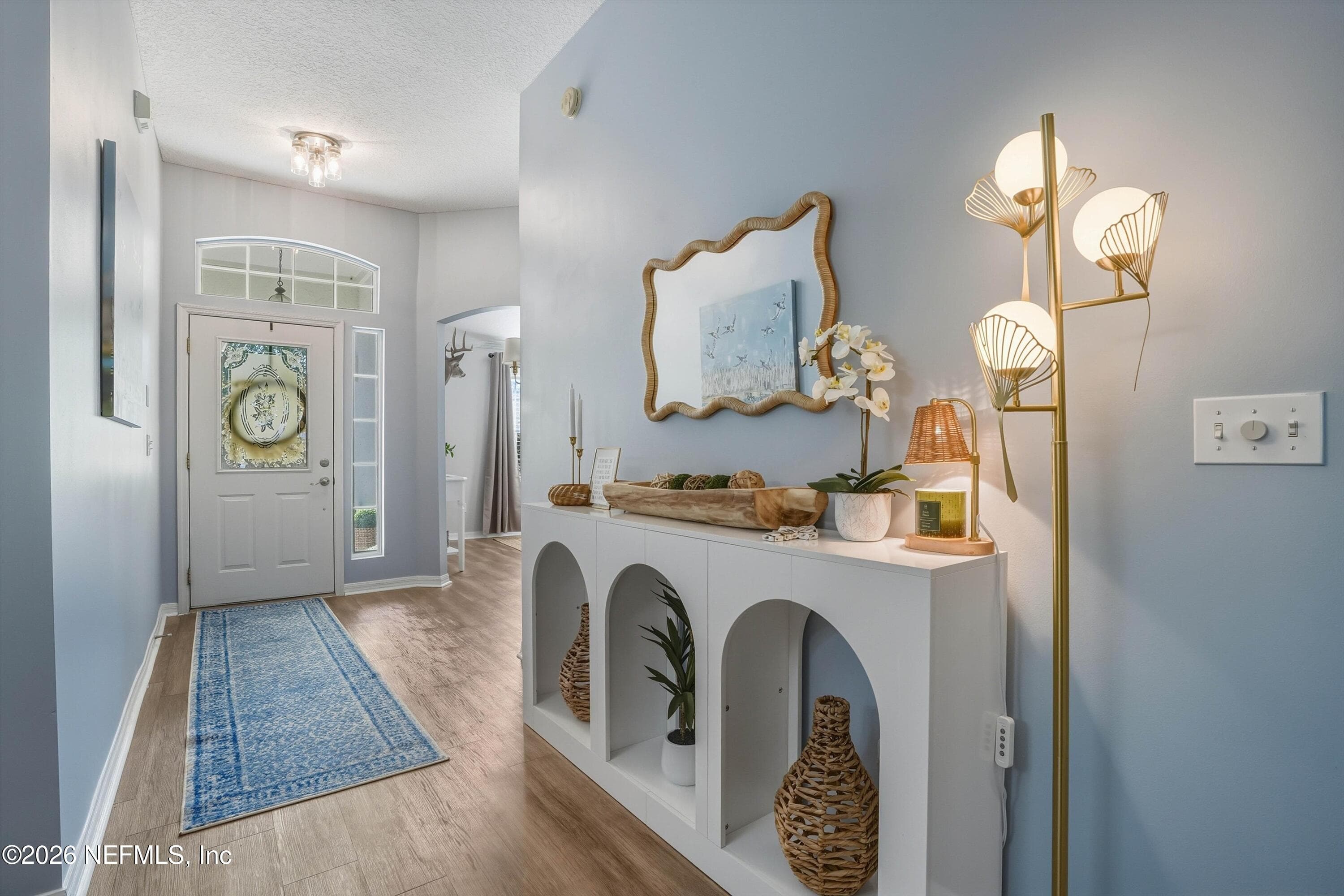 Home is now painted white throughout. — 717 LOCKWOOD Lane, St. Johns, FL 32259