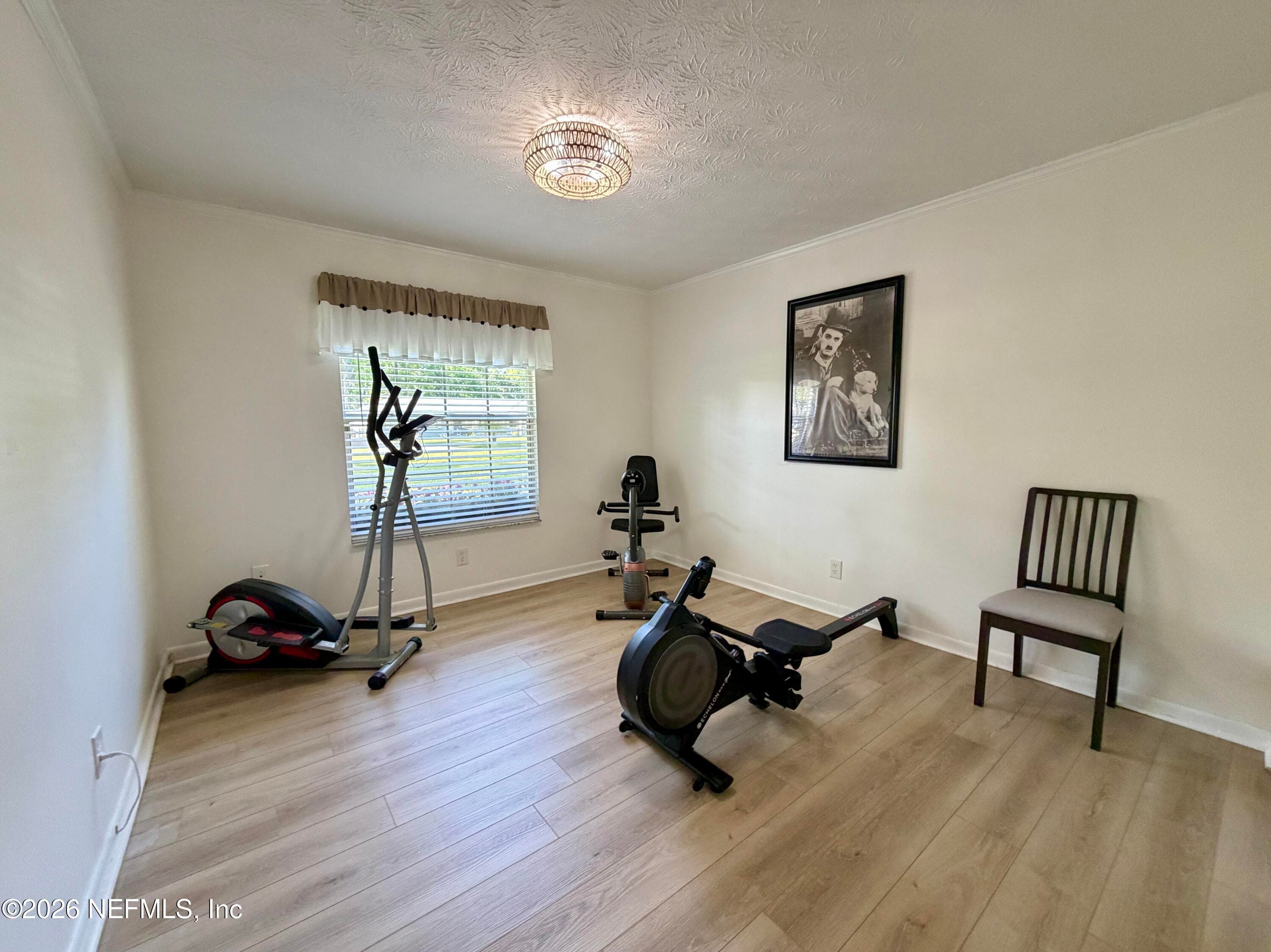 Bedroom 3 as a gym — 332 WHISPERING WOODS Drive, Fleming Island, FL 32003