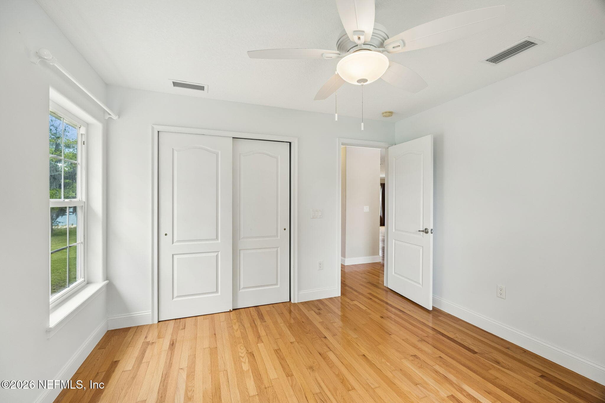 Each of the guest bedrooms include ample closet space — 102 SANDRA Lane, Crescent City, FL 32112