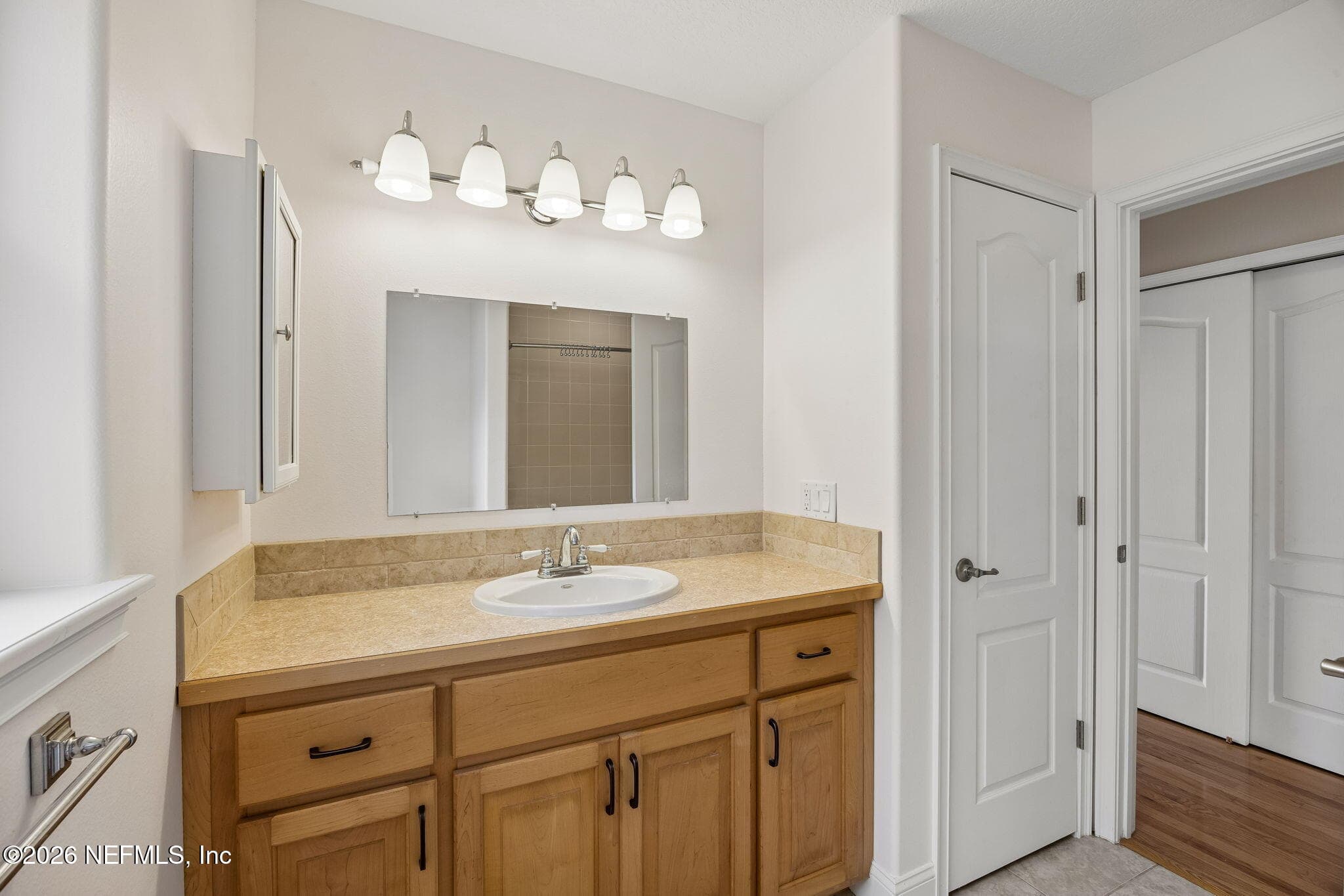 They are separated by the guest bathroom — 102 SANDRA Lane, Crescent City, FL 32112