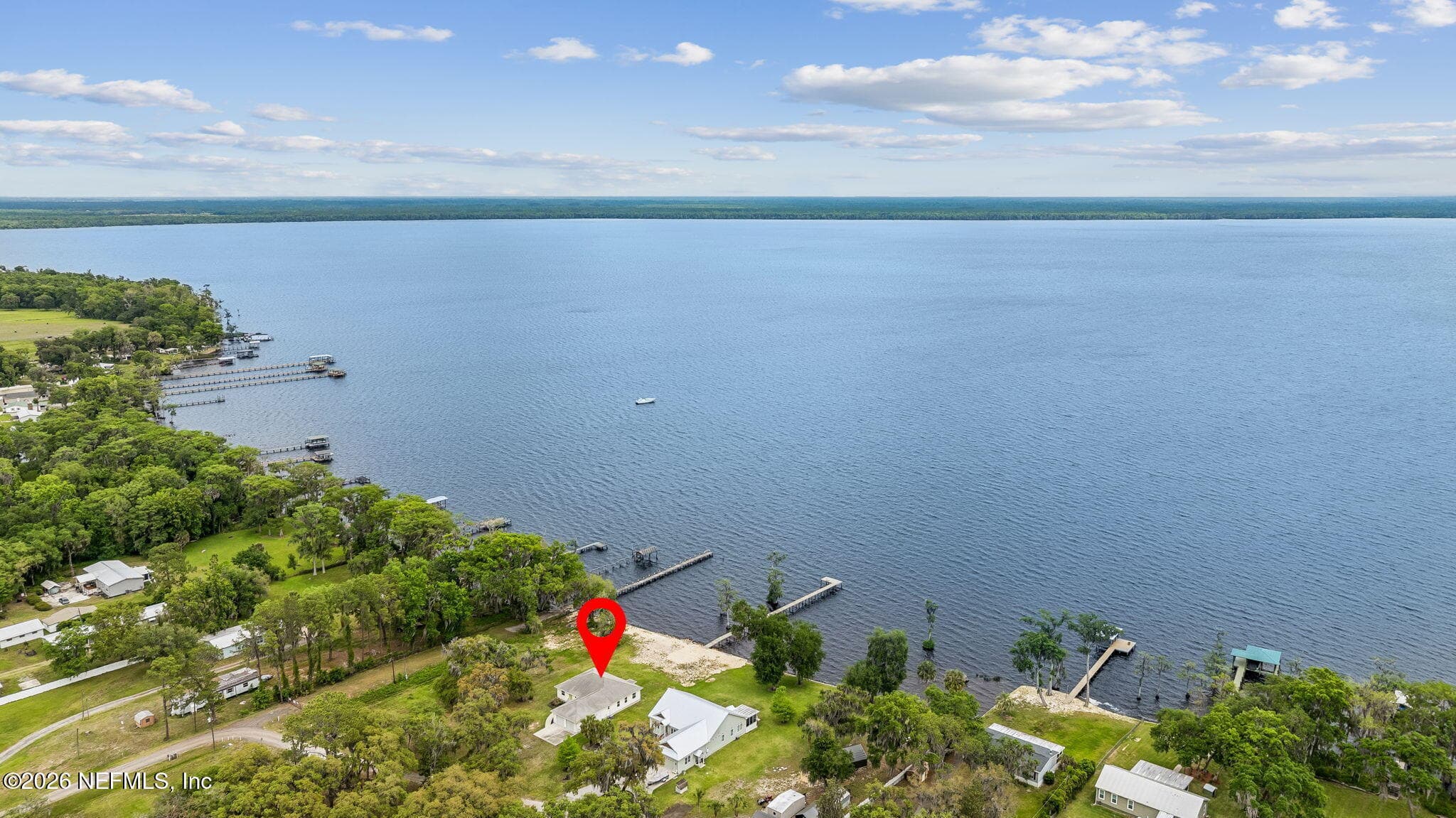 This aerial photo gives you a good idea of just how vast this awesome lake is — 102 SANDRA Lane, Crescent City, FL 32112