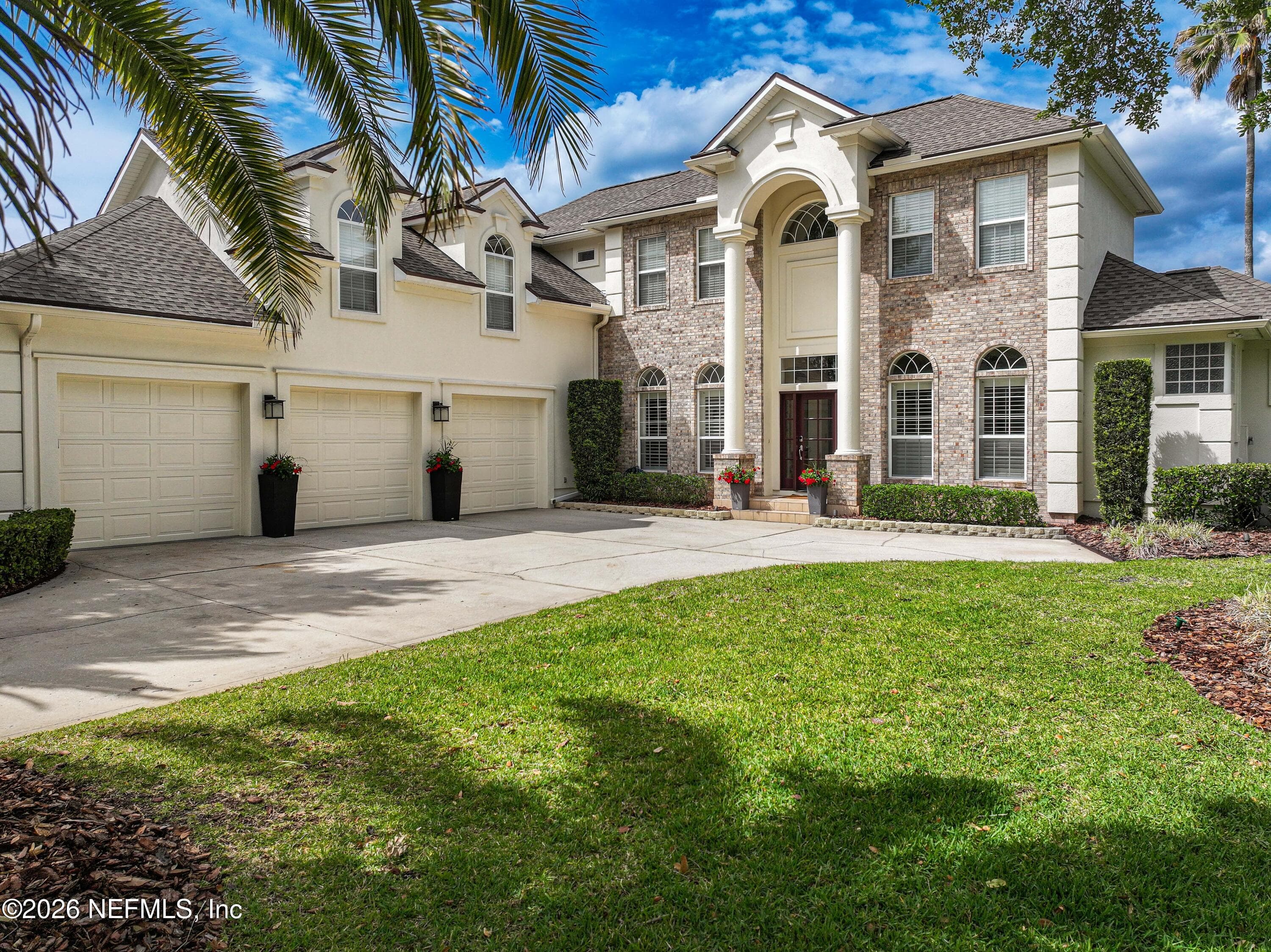 A spacious three-car garage complemented by an elegant paver driveway offers both convenience and impressive curb appeal. — 188 CLEARLAKE Drive, Ponte Vedra Beach, FL 32082