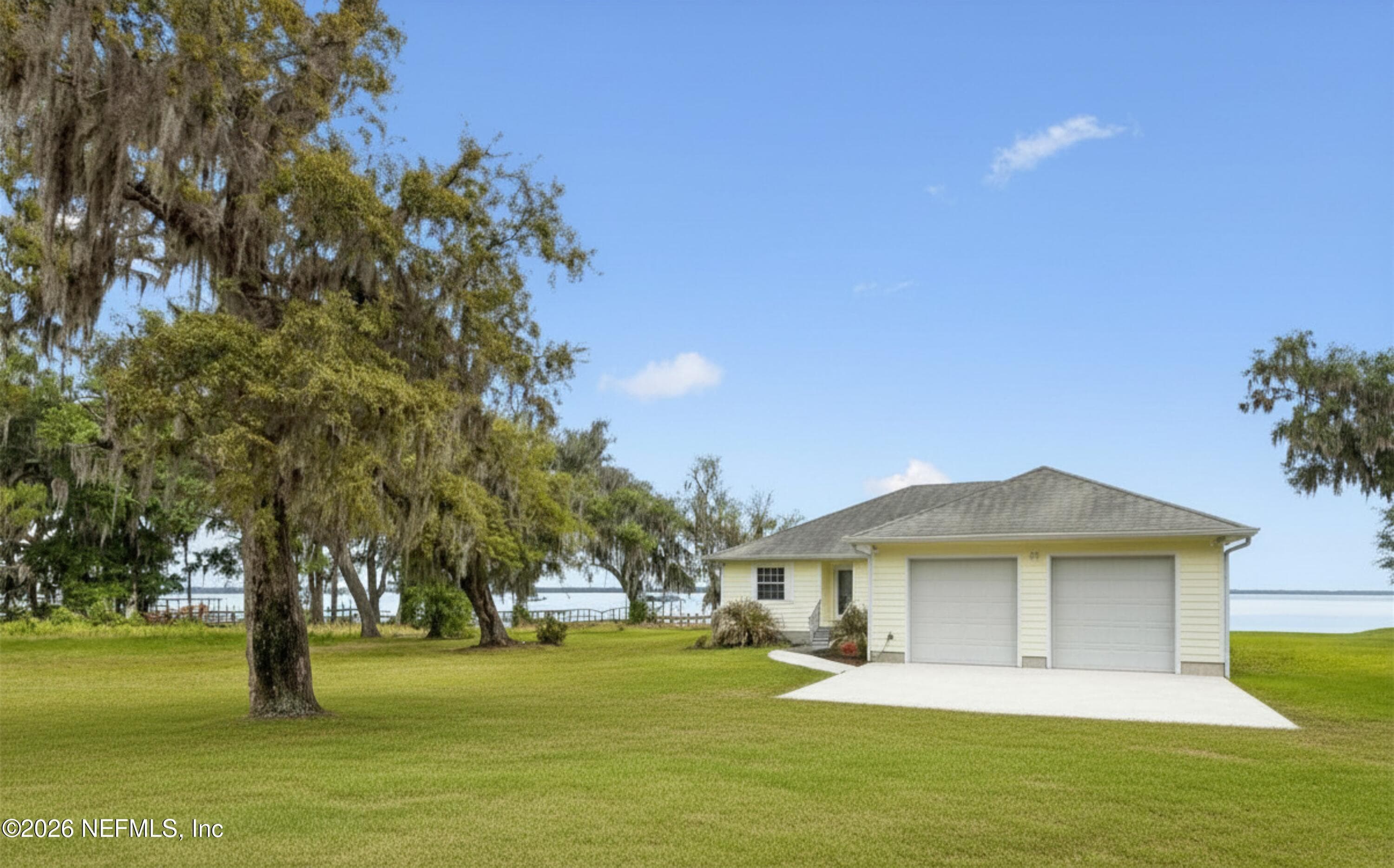 This .73 acre property is just perfect for entertaining family and friends — 102 SANDRA Lane, Crescent City, FL 32112