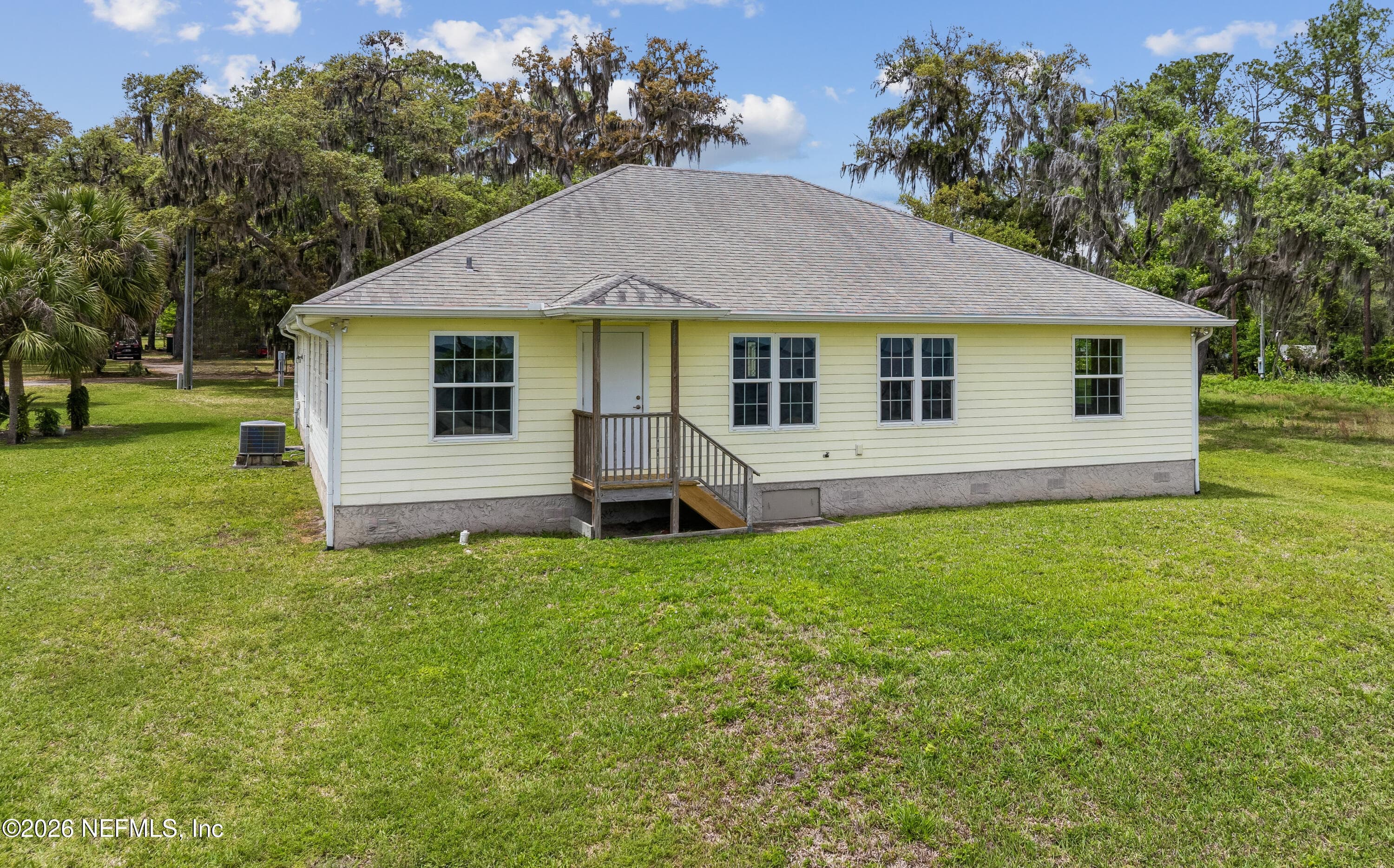 You might even want to add a screened porch to enhance the enjoyment of your new home — 102 SANDRA Lane, Crescent City, FL 32112