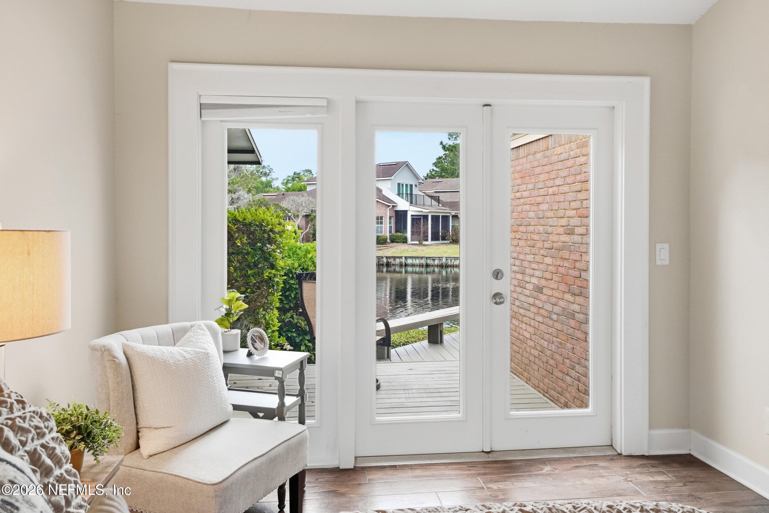 French Doors to Deck and View of the lake enjoy your morning coffee. — 7805 DEERWOOD POINT Court 1402, Jacksonville, FL 32256