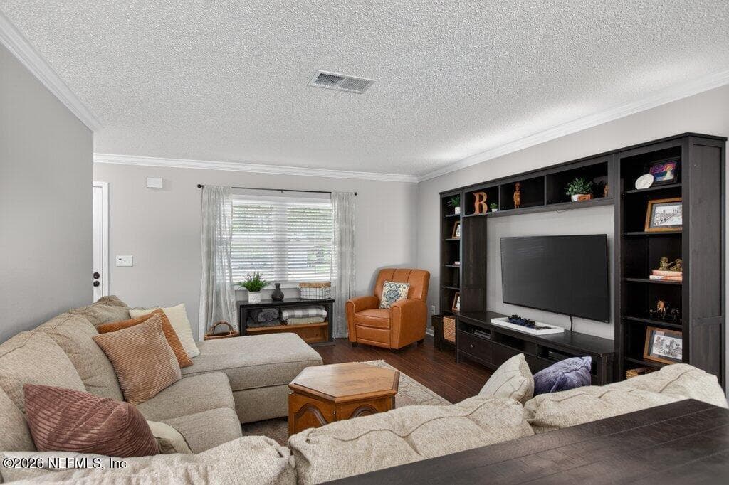 Sun-drenched living space featuring expansive windows, and a seamless flow perfect for entertaining. — 956 ESPINADO Avenue, St. Augustine, FL 32086